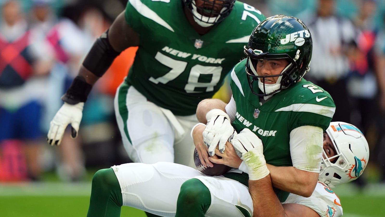 Miami Dolphins defensive tackle Zach Sieler (92) sacks New York Jets quarterback Zach Wilson (2) during the first half at Hard Rock Stadium. / Jasen Vinlove-USA TODAY Sports