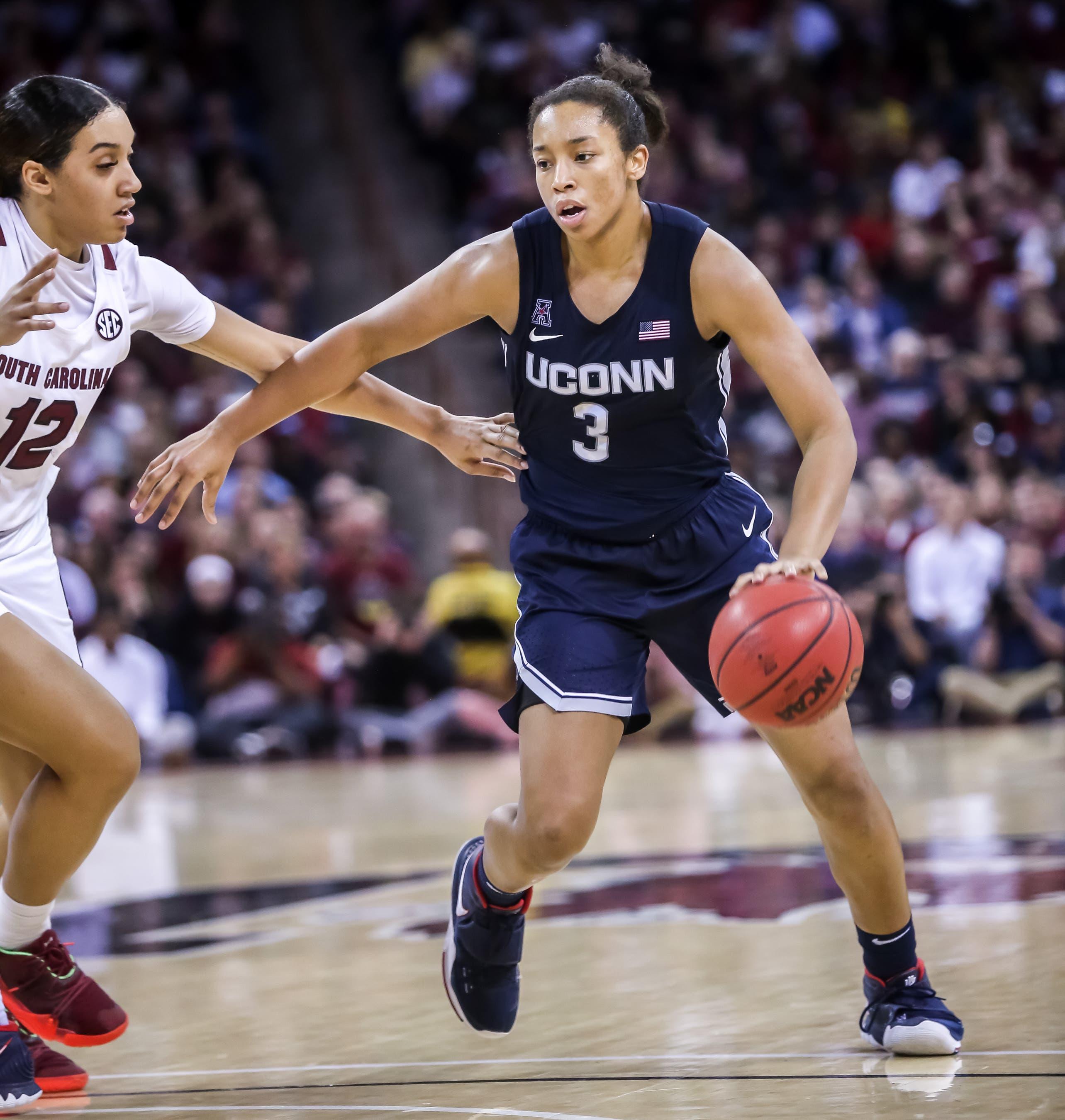 Feb 10, 2020; Columbia, South Carolina, USA; UConn Huskies forward Megan Walker (3) drives around South Carolina Gamecocks guard Brea Beal (12) in the second half at Colonial Life Arena. Mandatory Credit: Jeff Blake-USA TODAY Sports / Jeff Blake