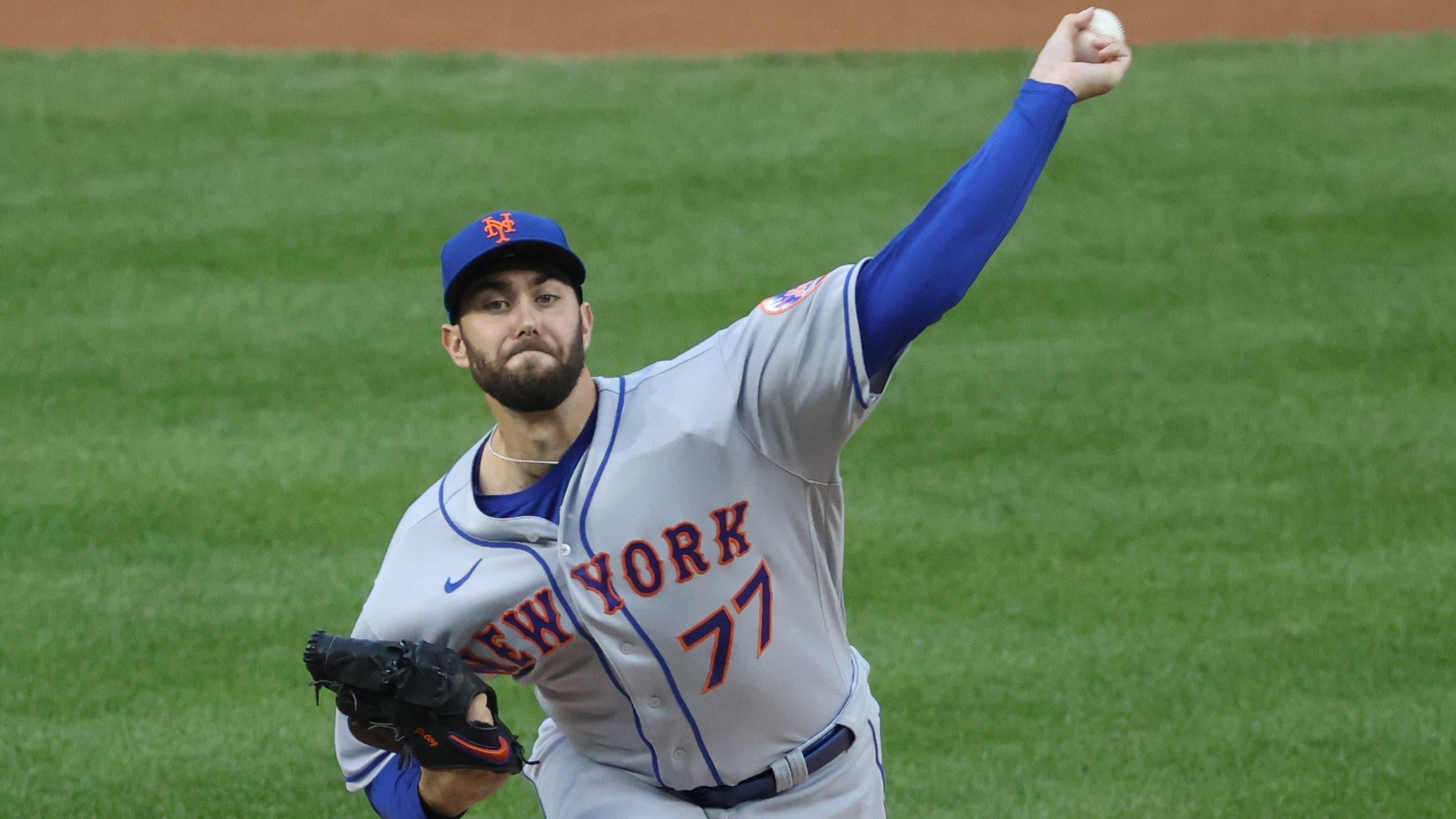 Sep 24, 2020; Washington, District of Columbia, USA; New York Mets starting pitcher David Peterson (77) pitches against the Washington Nationals in the first inning at Nationals Park. Mandatory Credit: Geoff Burke-USA TODAY Sports / © Geoff Burke-USA TODAY Sports