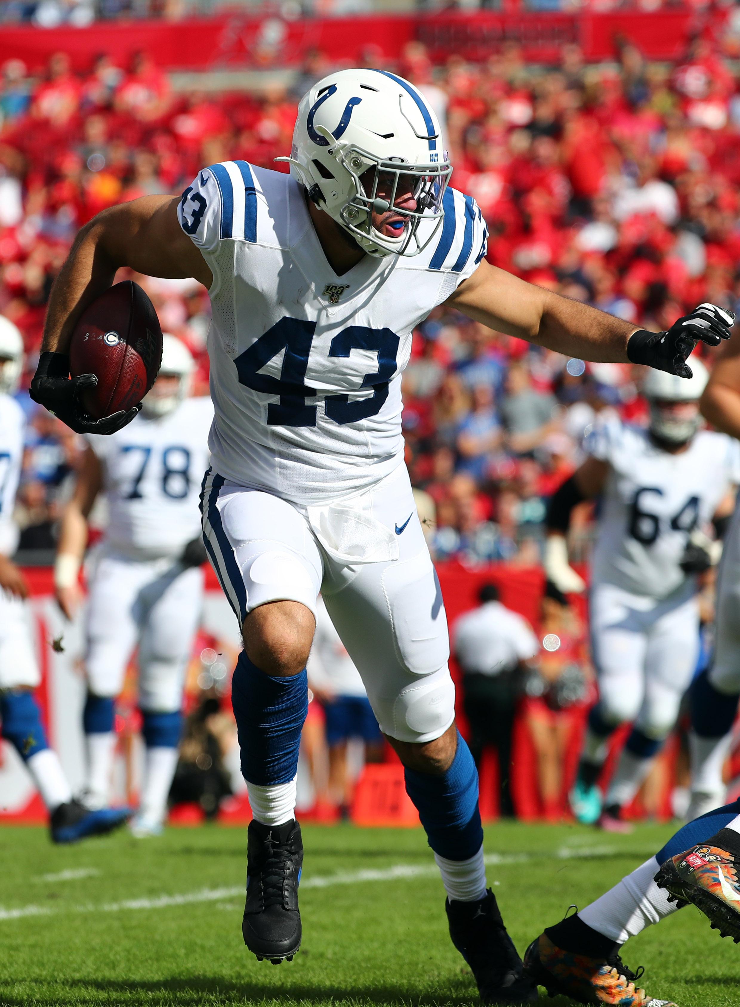 Dec 8, 2019; Tampa, FL, USA; Indianapolis Colts tight end Ross Travis (43) runs with the ball during the first half against the Tampa Bay Buccaneers at Raymond James Stadium. Mandatory Credit: Kim Klement-USA TODAY Sports