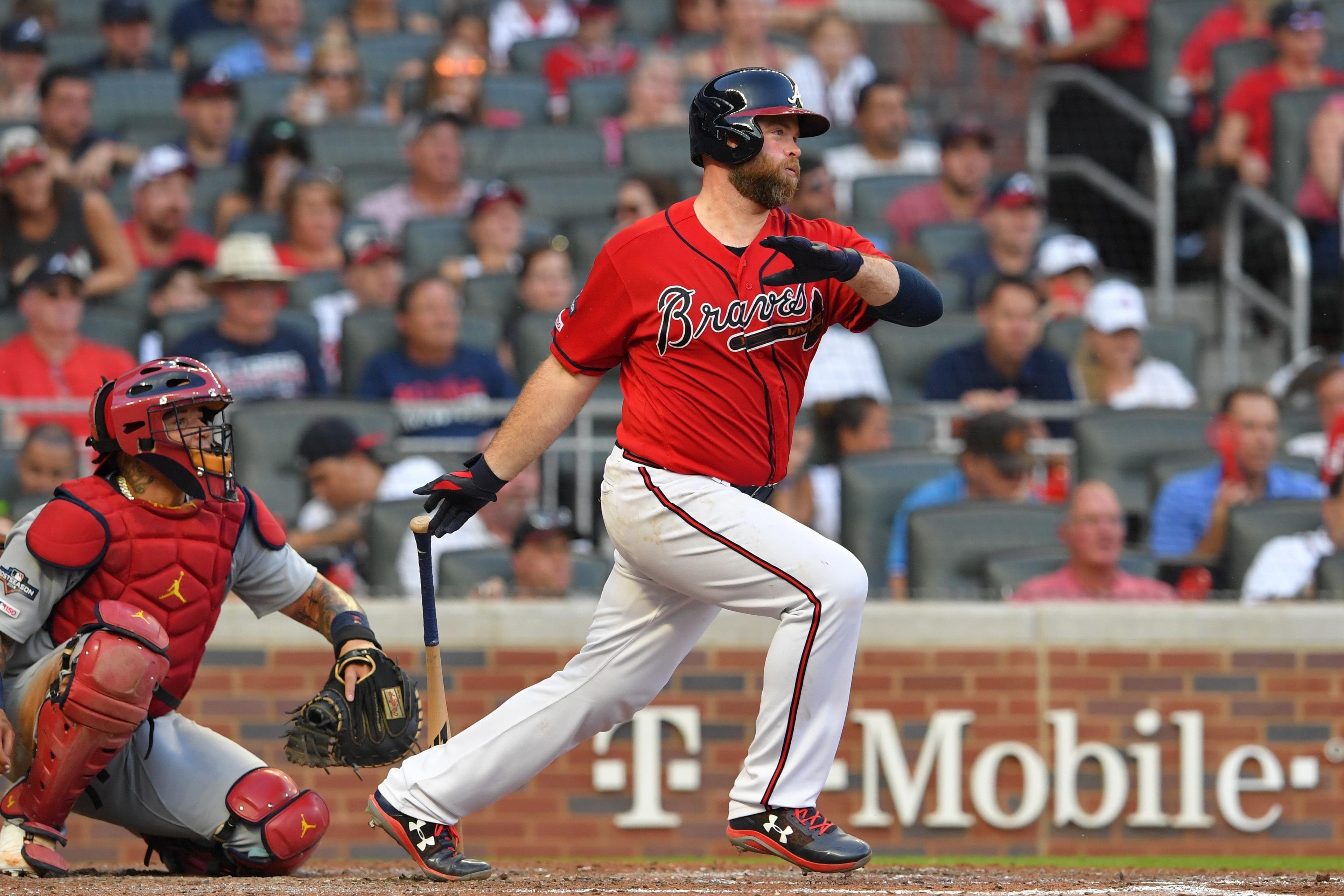 Oct 4, 2019; Atlanta, GA, USA; Atlanta Braves catcher Brian McCann (16) hits a single against the St. Louis Cardinals in the seventh inning of game two of the 2019 NLDS playoff baseball series at SunTrust Park. Mandatory Credit: Dale Zanine-USA TODAY Sports / Dale Zanine