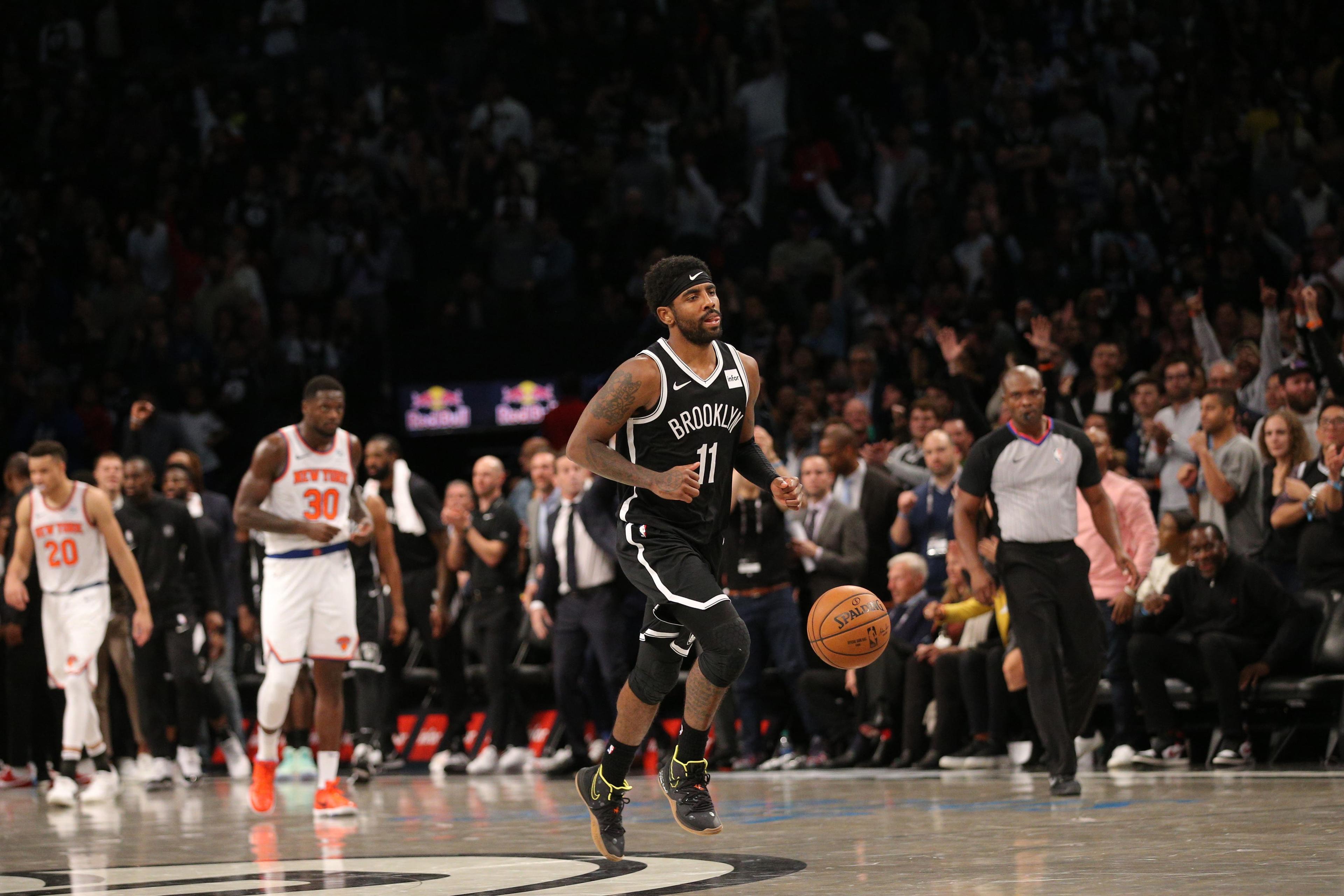 Oct 25, 2019; Brooklyn, NY, USA; Brooklyn Nets point guard Kyrie Irving (11) reacts after defeating the New York Knicks at Barclays Center. Mandatory Credit: Brad Penner-USA TODAY Sports / Brad Penner