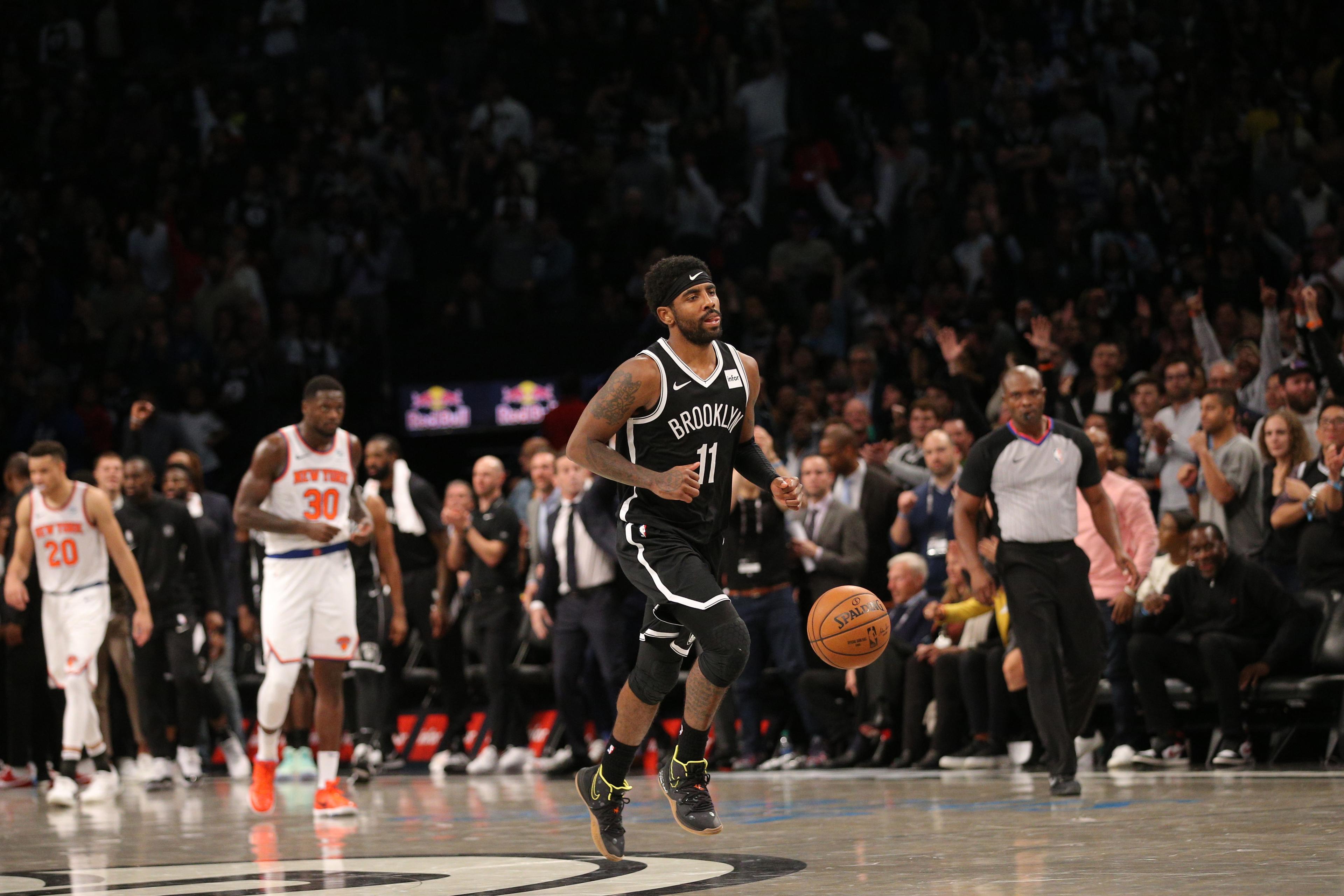 Oct 25, 2019; Brooklyn, NY, USA; Brooklyn Nets point guard Kyrie Irving (11) reacts after defeating the New York Knicks at Barclays Center. Mandatory Credit: Brad Penner-USA TODAY Sports 