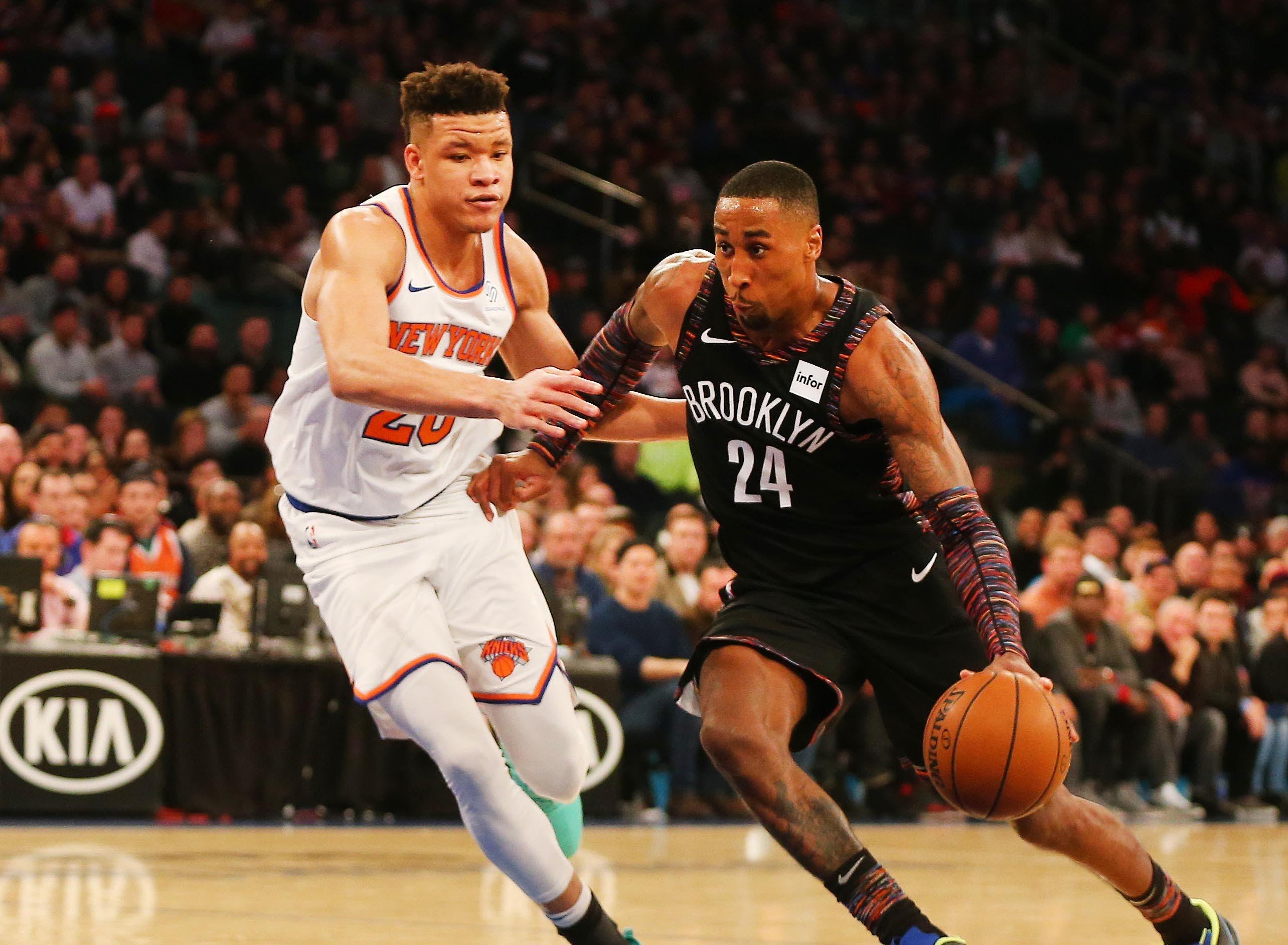 Dec 8, 2018; New York, NY, USA; Brooklyn Nets forward Rondae Hollis-Jefferson (24) dribbles the ball against New York Knicks forward Kevin Knox (20) during the second half at Madison Square Garden. Mandatory Credit: Andy Marlin-USA TODAY Sports / Andy Marlin