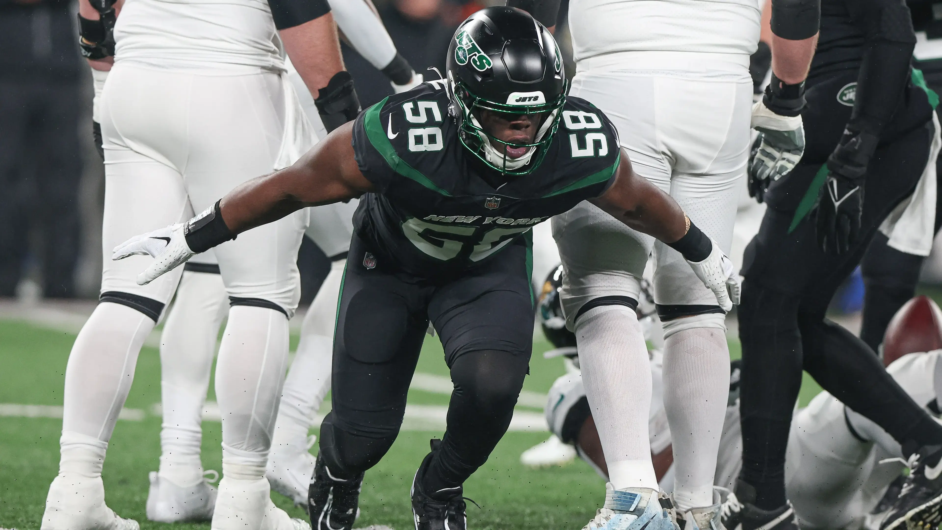 New York Jets defensive end Carl Lawson (58) celebrates a defensive stop during the first half against the Jacksonville Jaguars at MetLife Stadium / Vincent Carchietta - USA TODAY Sports