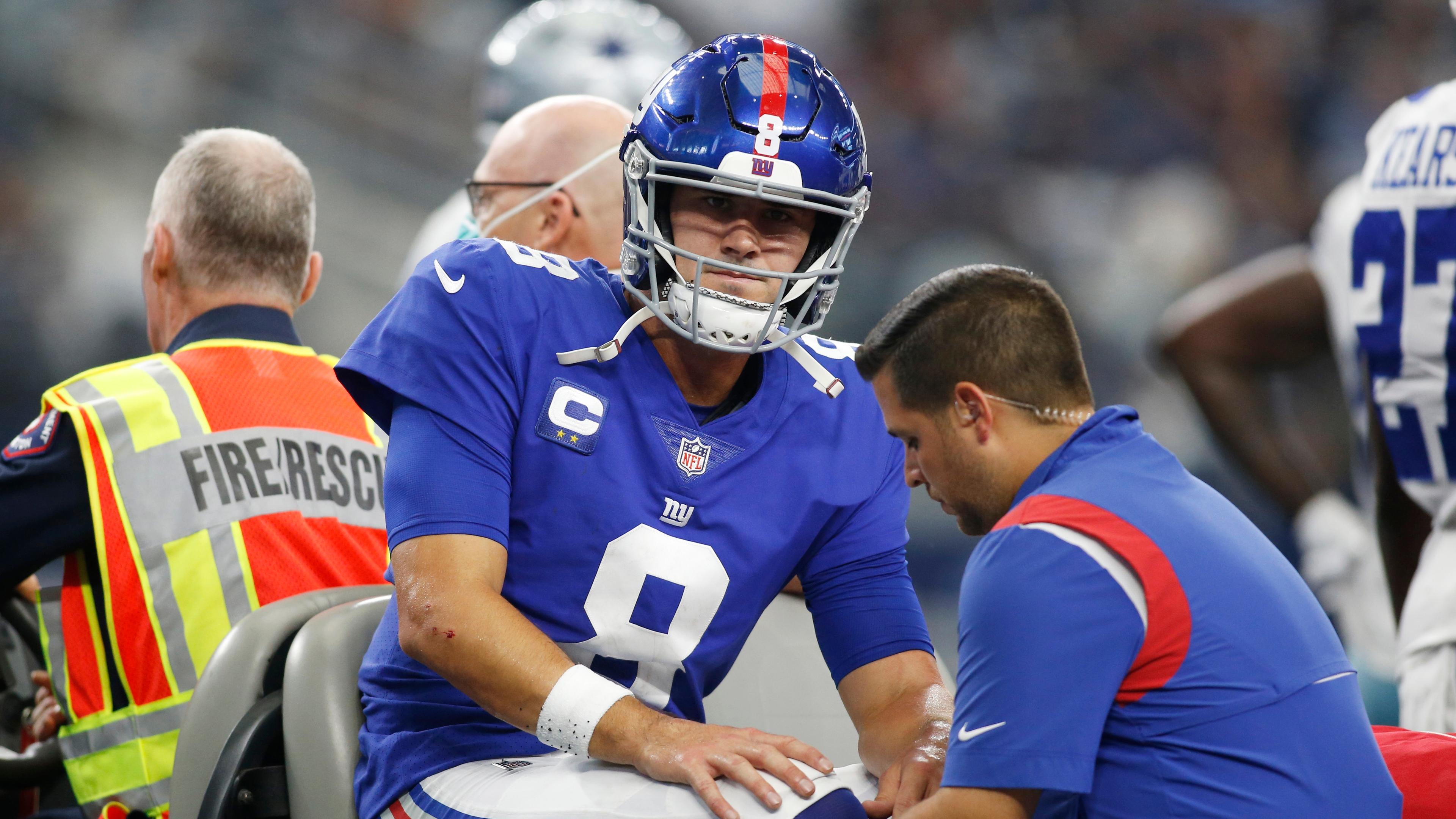 New York Giants quarterback Daniel Jones (8) leaves the field on a cart with an injury in the second quarter against the Dallas Cowboys at AT&T Stadium. / Tim Heitman-USA TODAY Sports