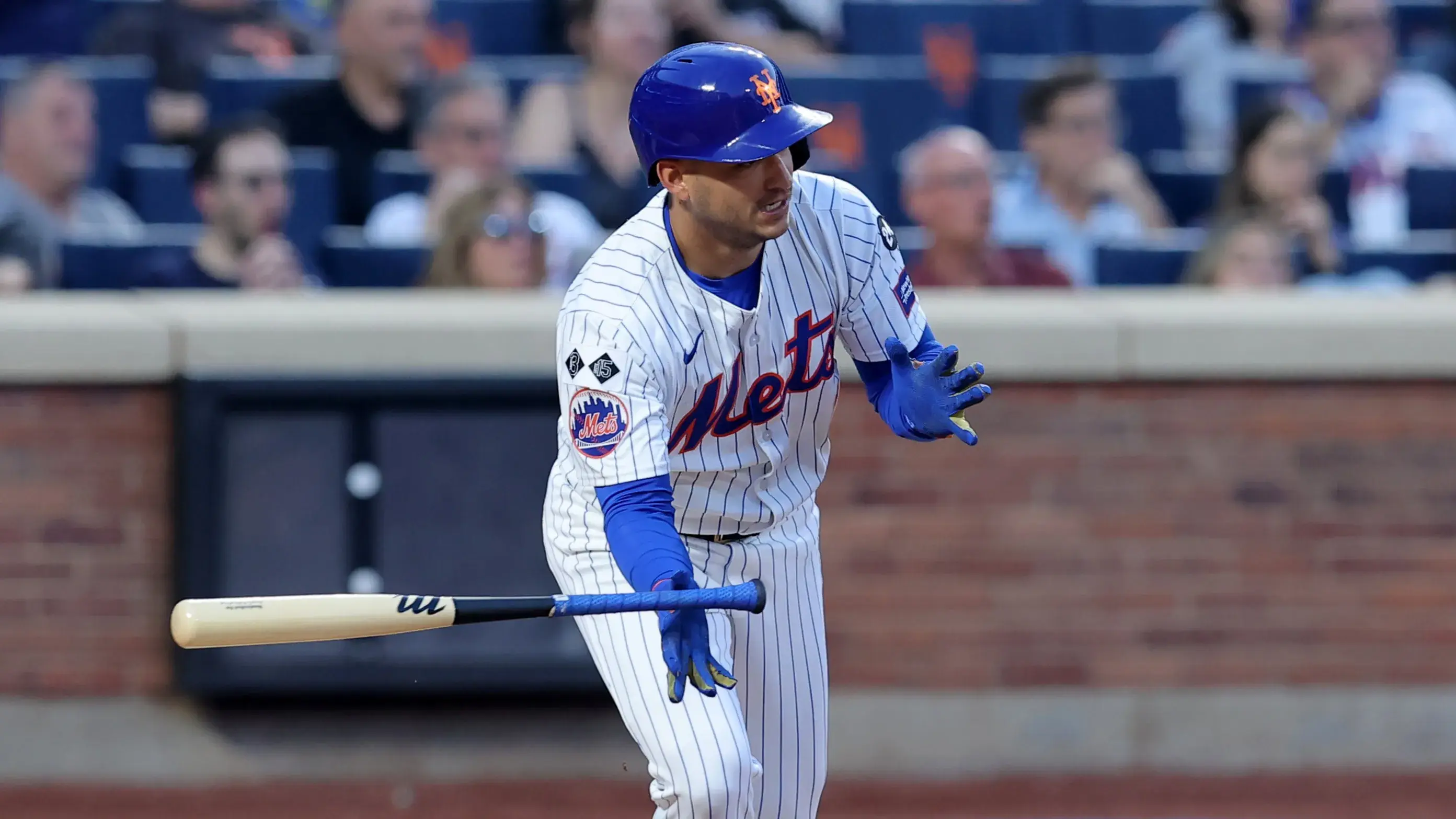 New York Mets third baseman Jose Iglesias (11) follows through on an RBI single during the second inning against the Oakland Athletics at Citi Field. / Brad Penner - Imagn Images