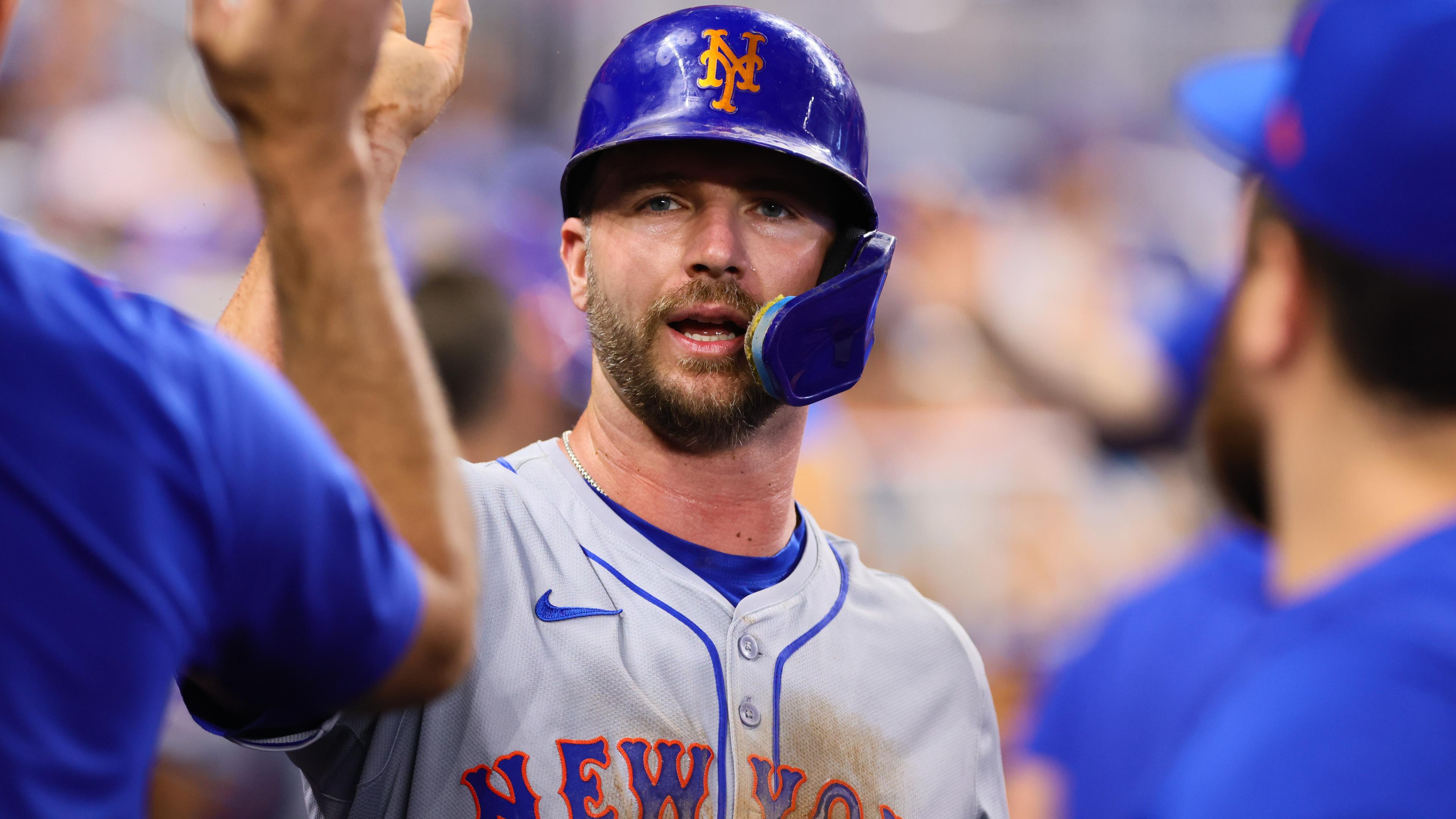 Jul 21, 2024; Miami, Florida, USA; New York Mets first baseman Pete Alonso (20) celebrates after scoring against the Miami Marlins during the fourth inning at loanDepot Park. Mandatory Credit: Sam Navarro-USA TODAY Sports