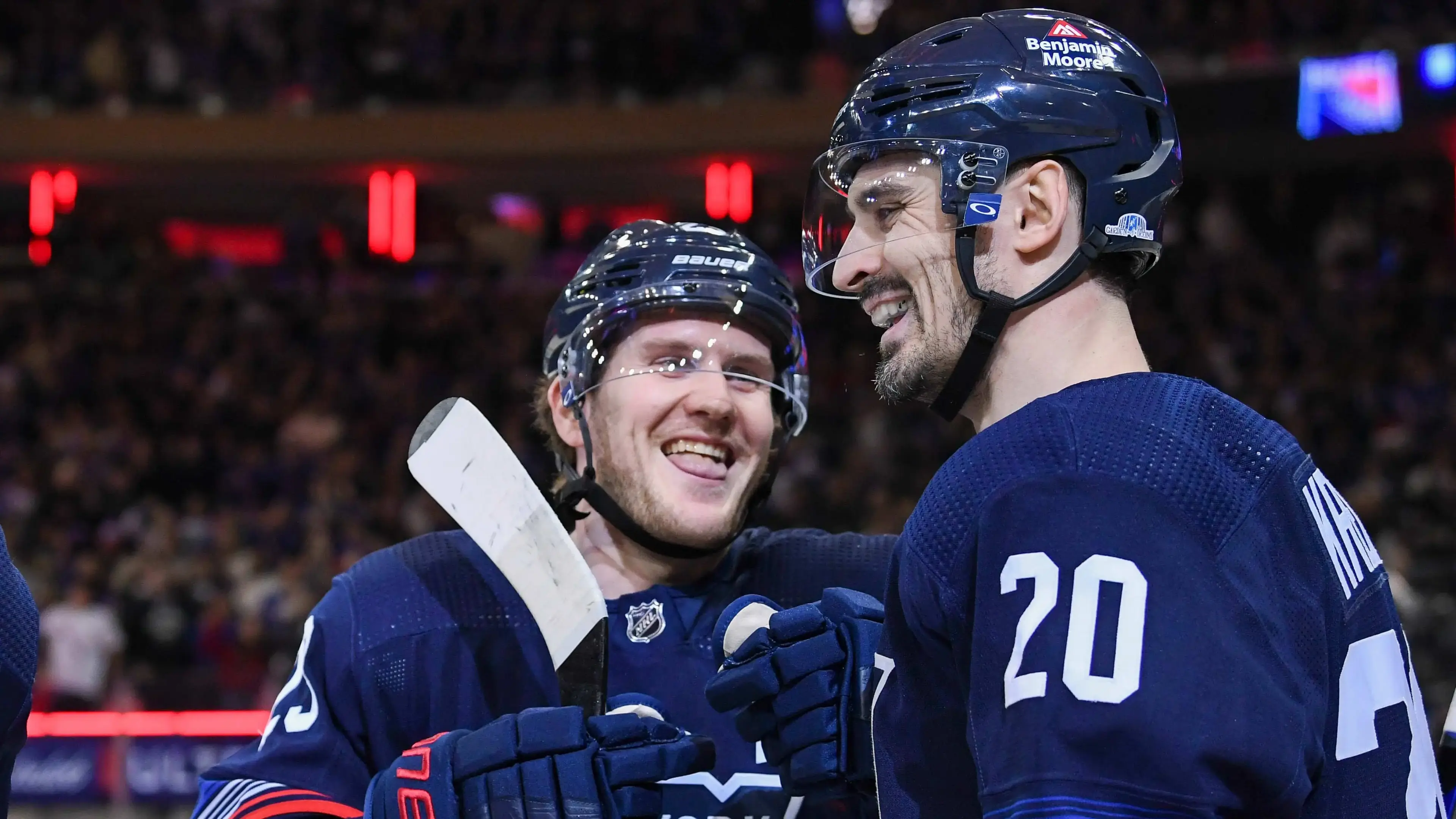 New York Rangers defenseman Adam Fox (23) and New York Rangers left wing Chris Kreider (20) celebrate the goal by New York Rangers left wing Artemi Panarin (10) against the Buffalo Sabres during the first period at Madison Square Garden / Dennis Schneidler - USA TODAY Sports