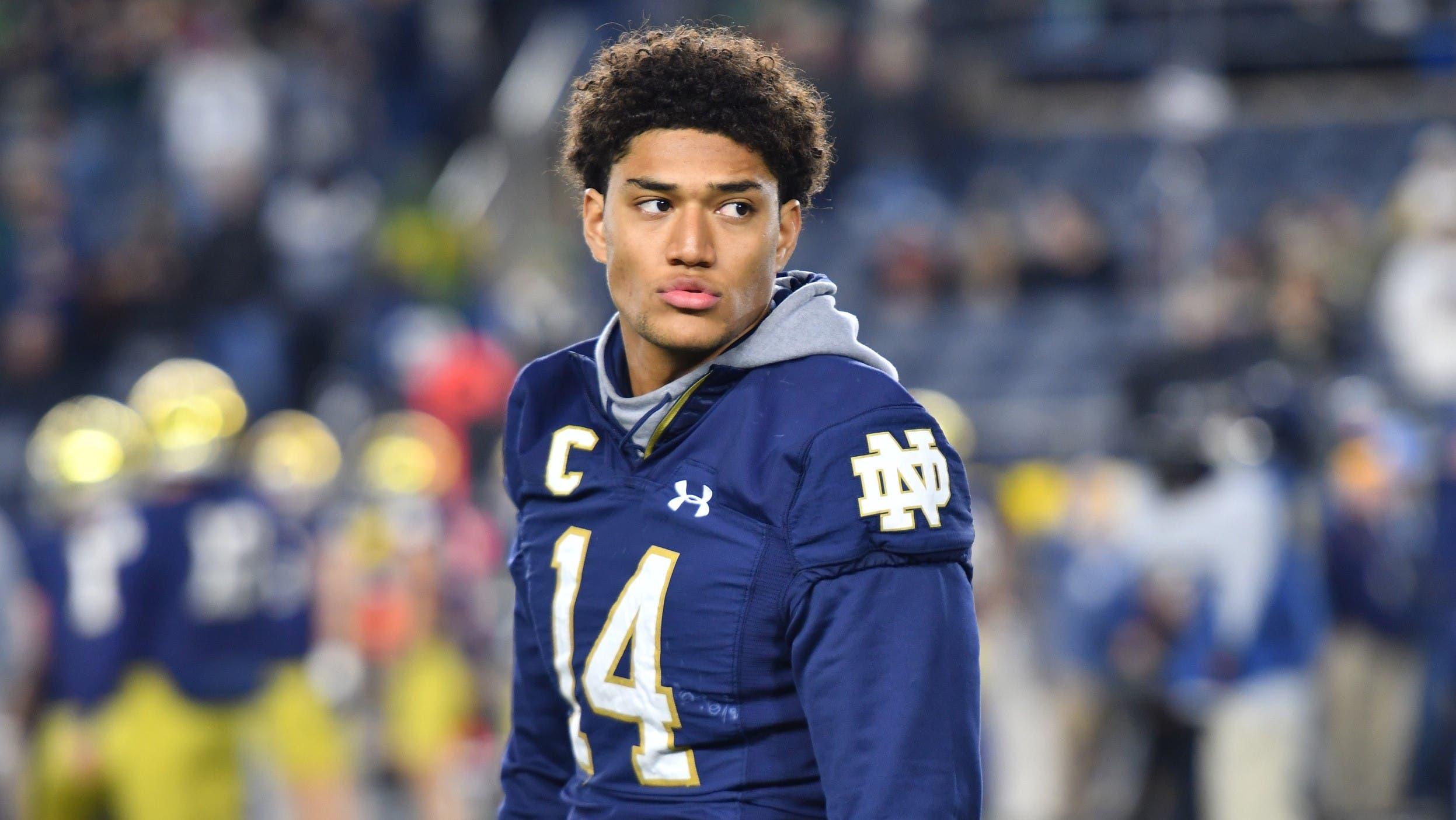 Oct 30, 2021; South Bend, Indiana, USA; Notre Dame Fighting Irish safety Kyle Hamilton (14) watches warm ups before the game against the North Carolina Tar Heels at Notre Dame Stadium. / Matt Cashore-USA TODAY Sports