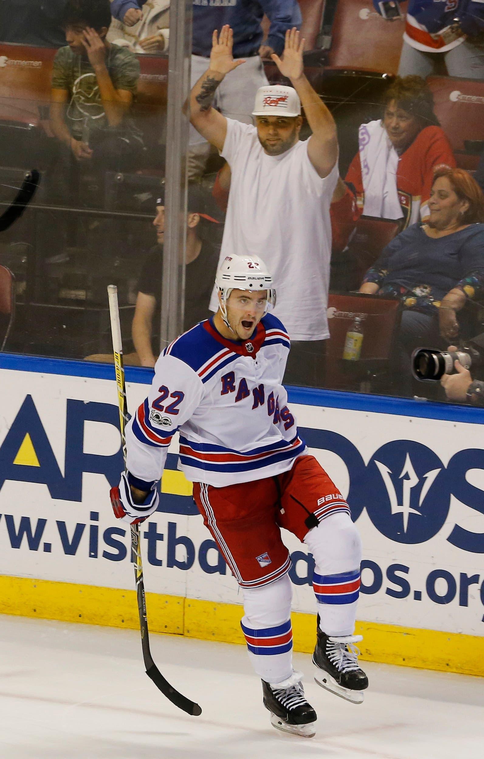 New York Rangers defenseman Kevin Shattenkirk (22) celebrates his game-winning overtime goal over the Florida Panthers in an NHL hockey game, Saturday, Nov. 4, 2017, in Sunrise, Fla. The Rangers won the game 5-4. (AP Photo/Joe Skipper) / Joe Skipper/AP