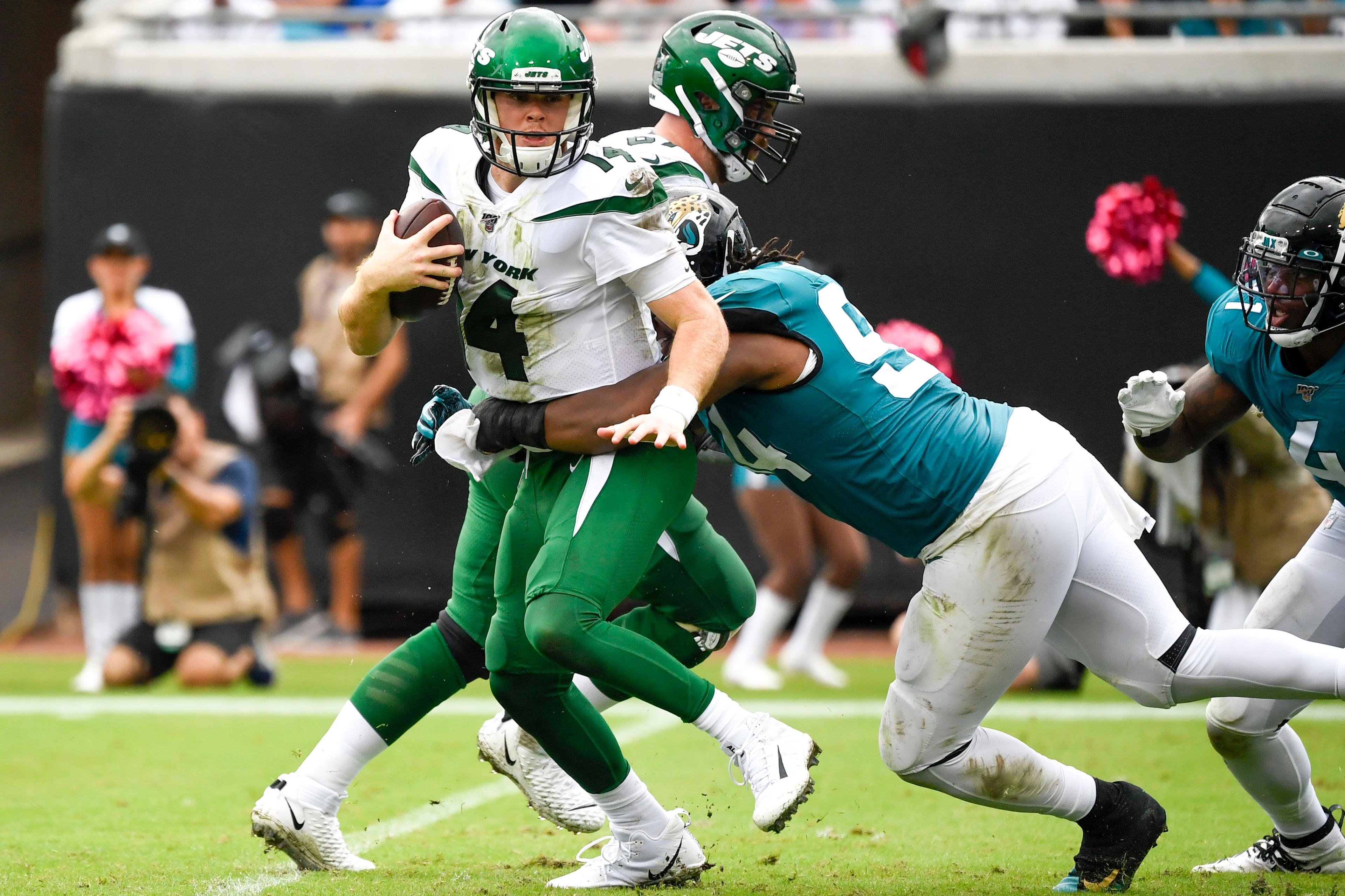 Oct 27, 2019; Jacksonville, FL, USA; Jacksonville Jaguars defensive end Dawuane Smoot (94) sacks New York Jets quarterback Sam Darnold (14) during the second quarter at TIAA Bank Field. Mandatory Credit: Douglas DeFelice-USA TODAY Sports