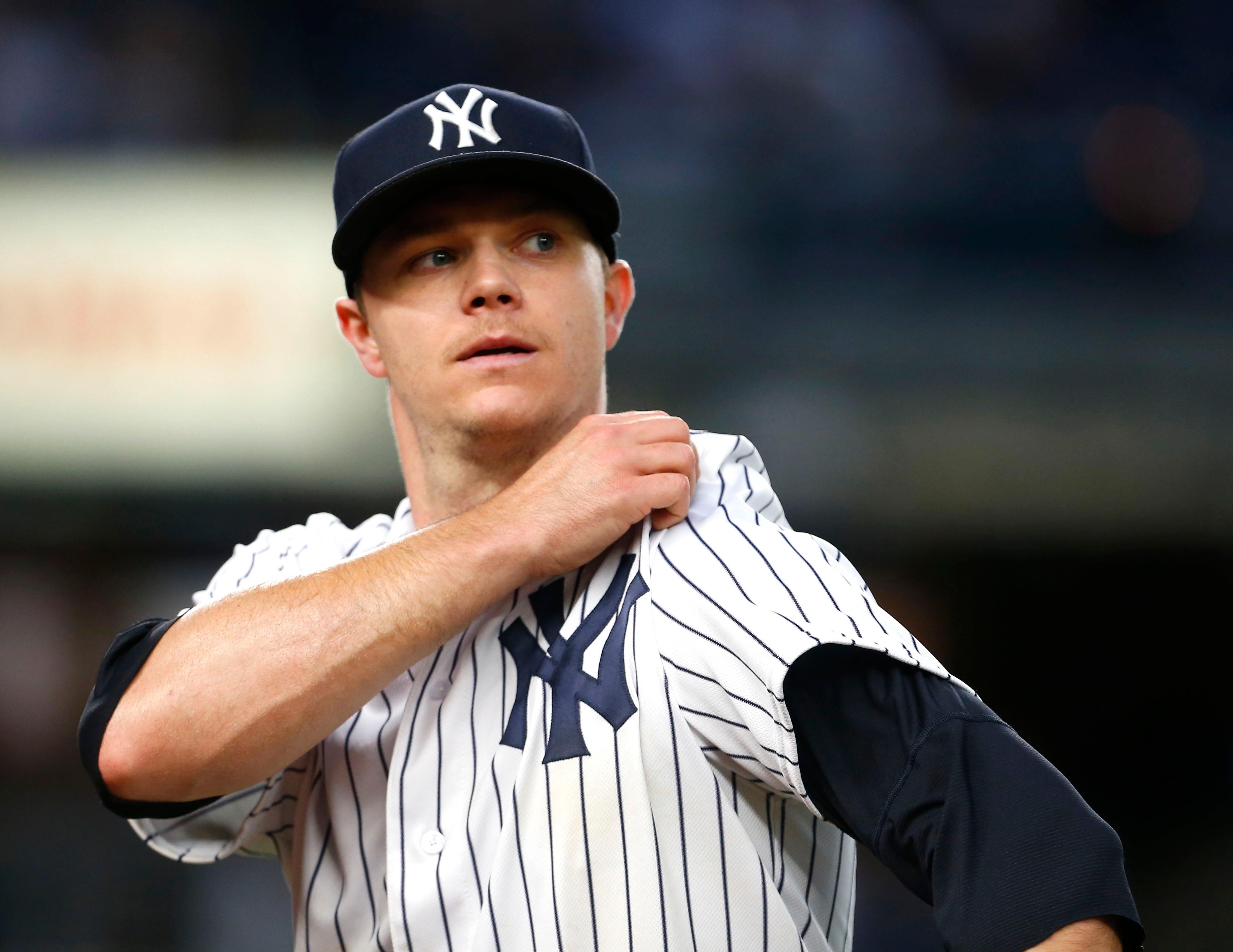 May 11, 2018; Bronx, NY, USA; New York Yankees starting pitcher Sonny Gray (55) reacts on his way to the dugout after giving up a run in the third inning against the Oakland Athletics at Yankee Stadium. Mandatory Credit: Noah K. Murray-USA TODAY Sports