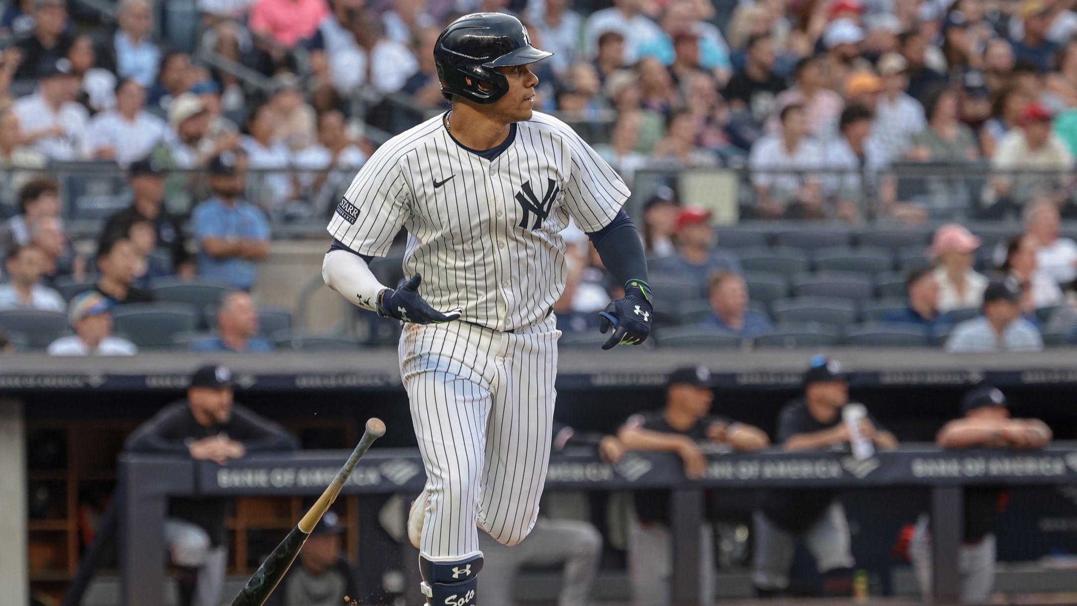 Jun 5, 2024; Bronx, New York, USA; New York Yankees right fielder Juan Soto (22) singles during the first inning against the Minnesota Twins at Yankee Stadium. / Vincent Carchietta-USA TODAY Sports