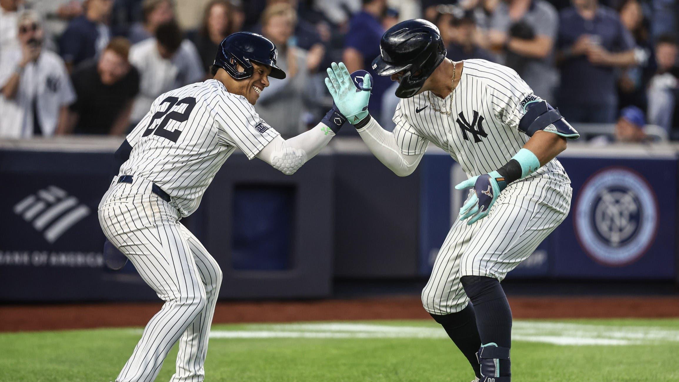 Aug 21, 2024; Bronx, New York, USA; New York Yankees center fielder Aaron Judge (99) celebrates with right fielder Juan Soto (22) after hitting a two run home run in the third inning against the Cleveland Guardians at Yankee Stadium. / Wendell Cruz-USA TODAY Sports