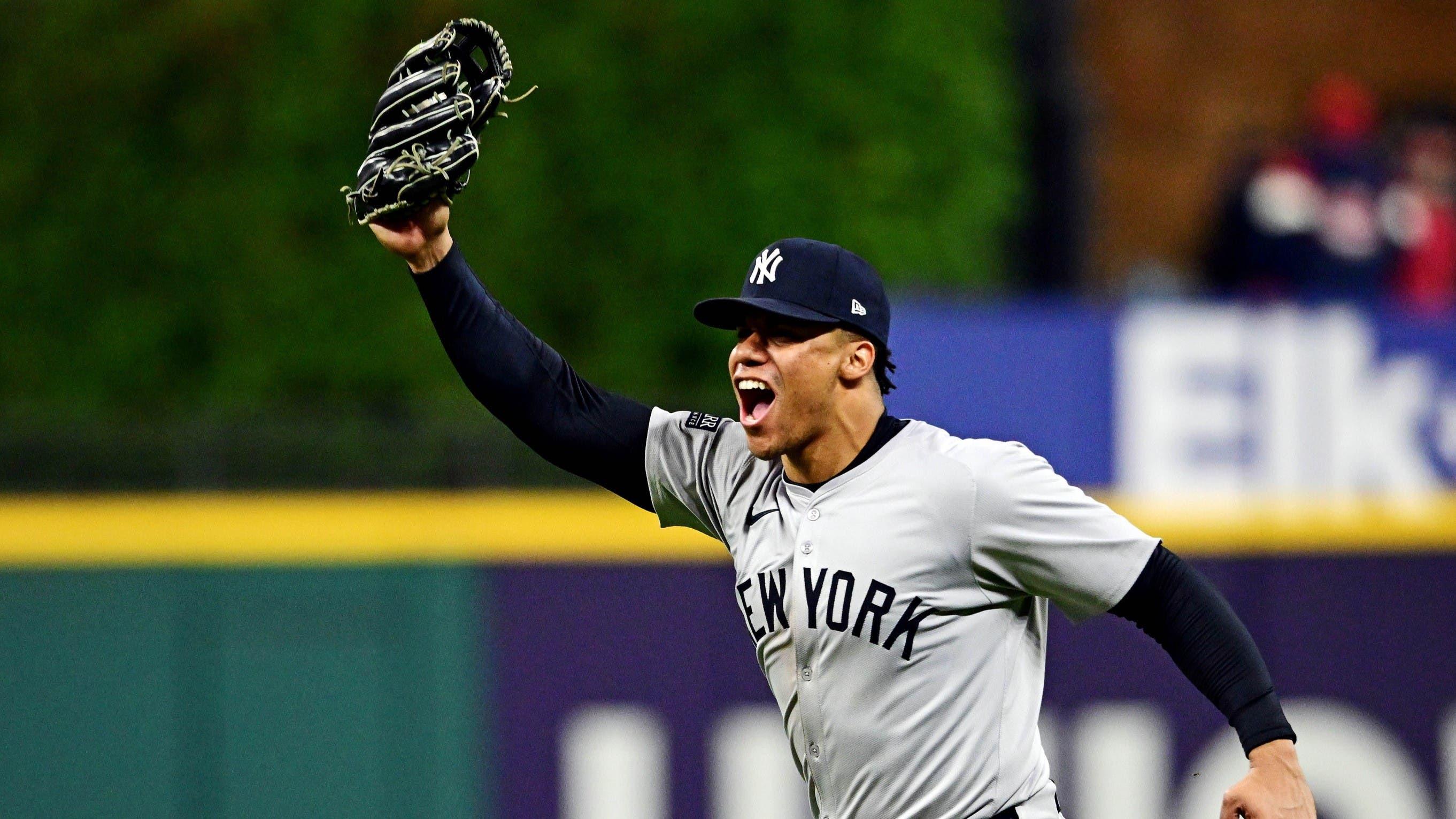 Oct 19, 2024; Cleveland, Ohio, USA; New York Yankees outfielder Juan Soto (22) celebrates after making the final out to beat the Cleveland Guardians during game five of the ALCS for the 2024 MLB playoffs at Progressive Field. / David Dermer-Imagn Images