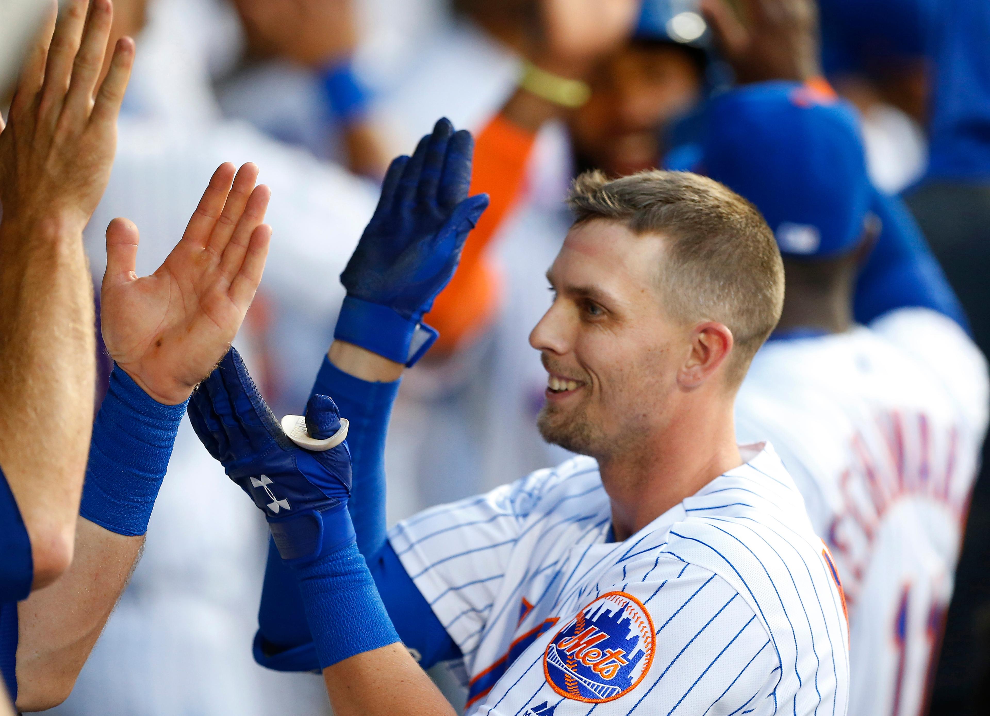 Jul 26, 2019; New York City, NY, USA; New York Mets left fielder Jeff McNeil (6) celebrates in the dugout after hitting a home run against the Pittsburgh Pirates in the third inning at Citi Field. Mandatory Credit: Noah K. Murray-USA TODAY Sports