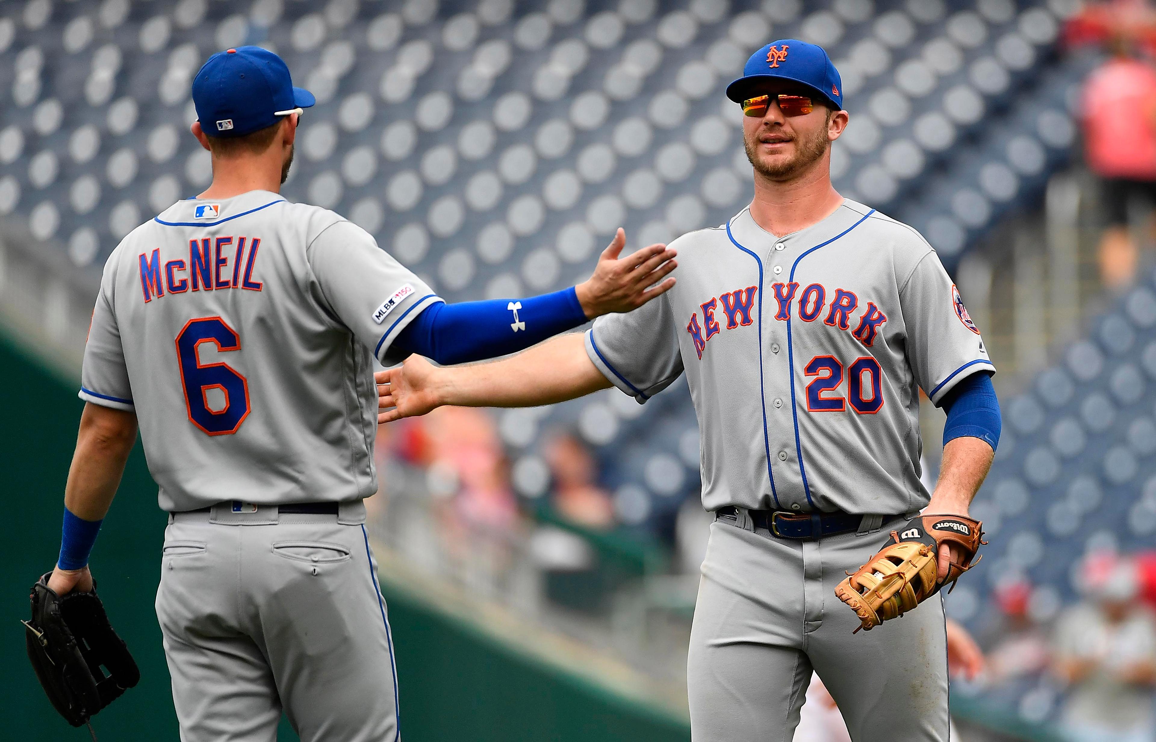 Sep 4, 2019; Washington, DC, USA; New York Mets first baseman Pete Alonso (20) and left fielder Jeff McNeil (6) celebrate after the game against the Washington Nationals at Nationals Park. Mandatory Credit: Brad Mills-USA TODAY Sports