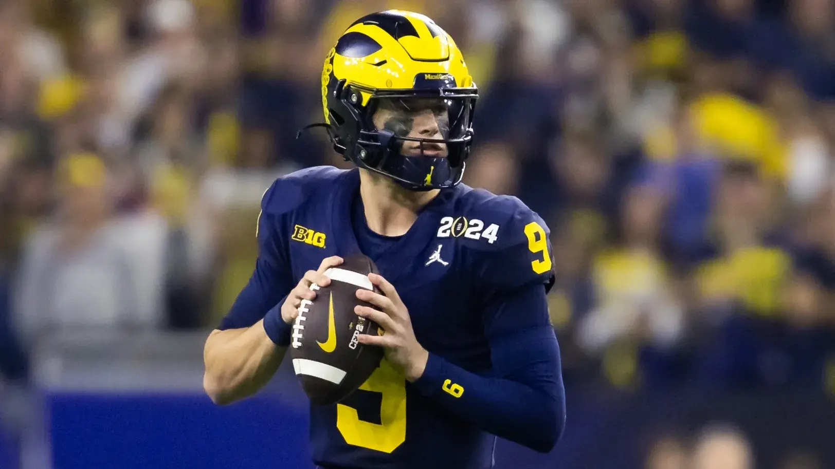 Jan 8, 2024; Houston, TX, USA; Michigan Wolverines quarterback J.J. McCarthy (9) against the Washington Huskies during the 2024 College Football Playoff national championship game at NRG Stadium. Mandatory Credit: Mark J. Rebilas-USA TODAY Sports / © Mark J. Rebilas-USA TODAY Sports