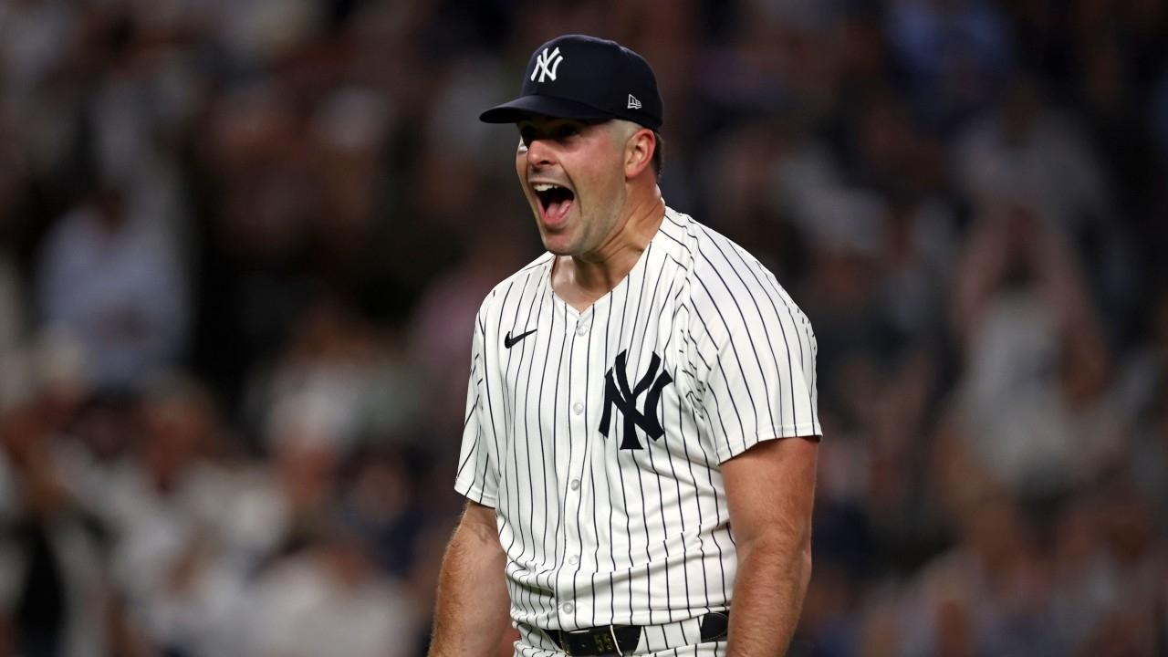 New York Yankees pitcher Carlos Rodon (55) reacts after a pitch against the Kansas City Royals in the first inning during game two of the ALDS for the 2024 MLB Playoffs at Yankee Stadium.