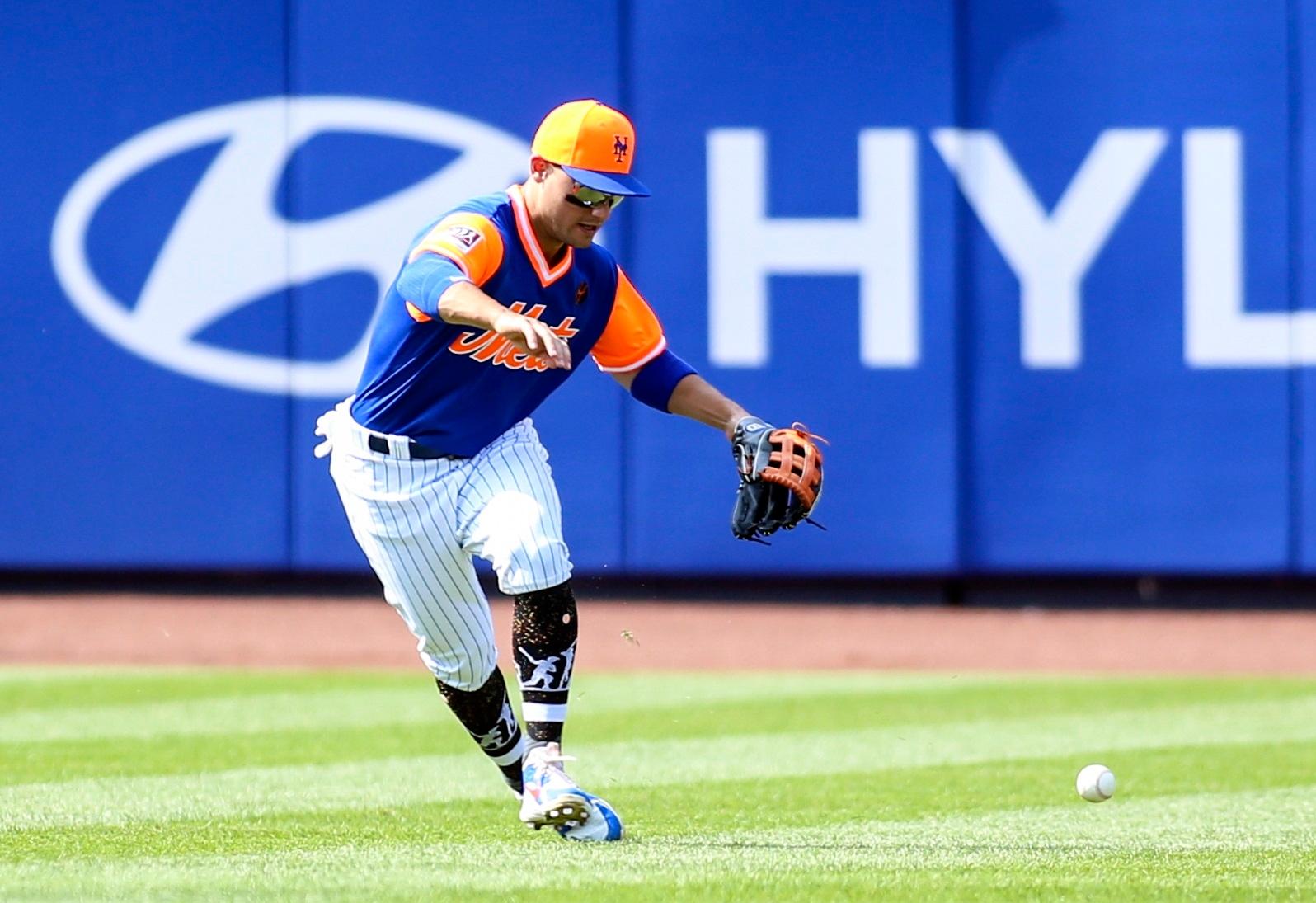 Sep 9, 2018; New York City, NY, USA; New York Mets outfielder Michael Conforto (30) hits a three-run home run during the fifth inning of the game against the Philadelphia Phillies at Citi Field. Mandatory Credit: Gregory J. Fisher-USA TODAY Sports