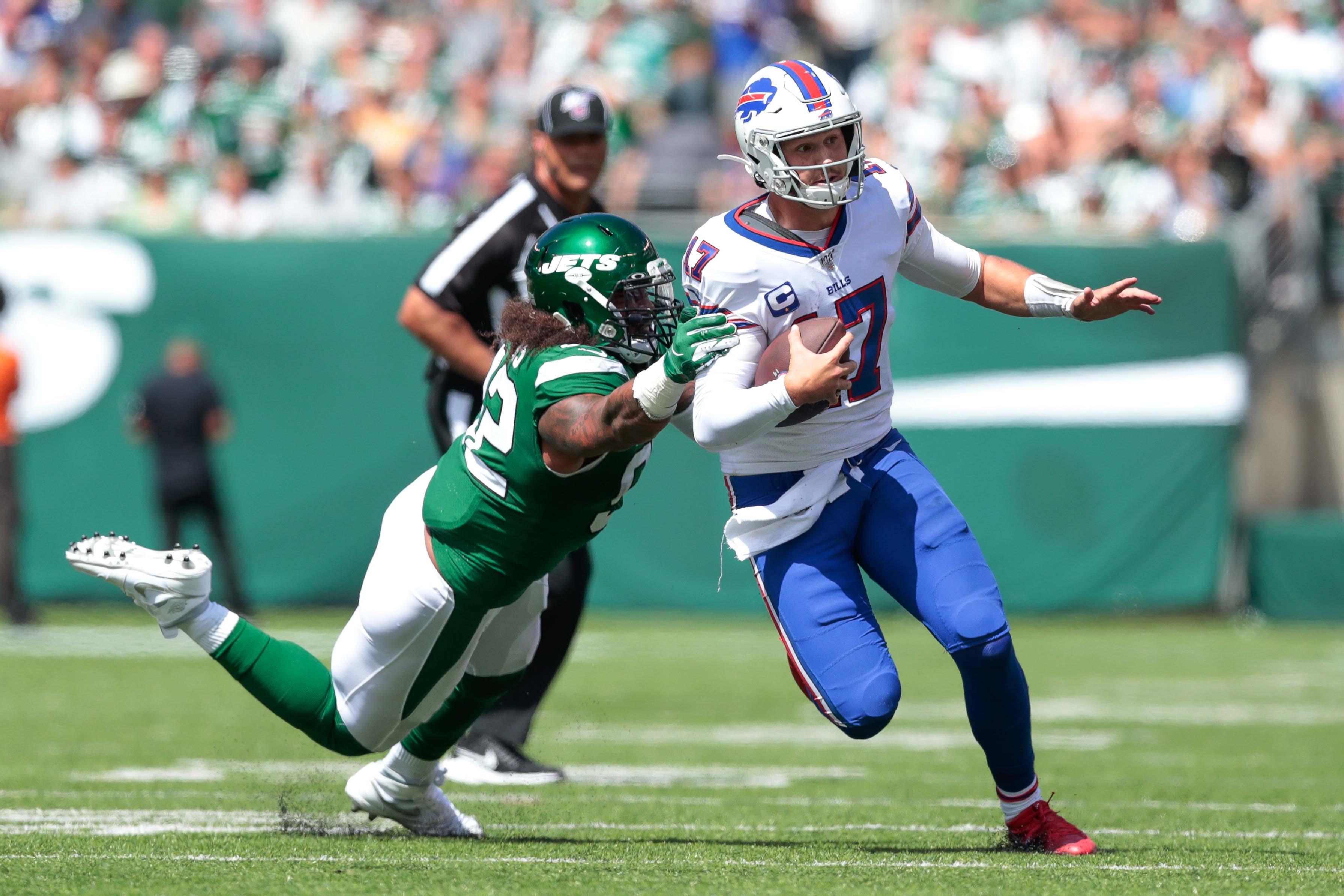 Sep 8, 2019; East Rutherford, NJ, USA; Buffalo Bills quarterback Josh Allen (17) carries the ball as New York Jets defensive end Leonard Williams (92) tackles during the first half at MetLife Stadium. Mandatory Credit: Vincent Carchietta-USA TODAY Sports / Vincent Carchietta