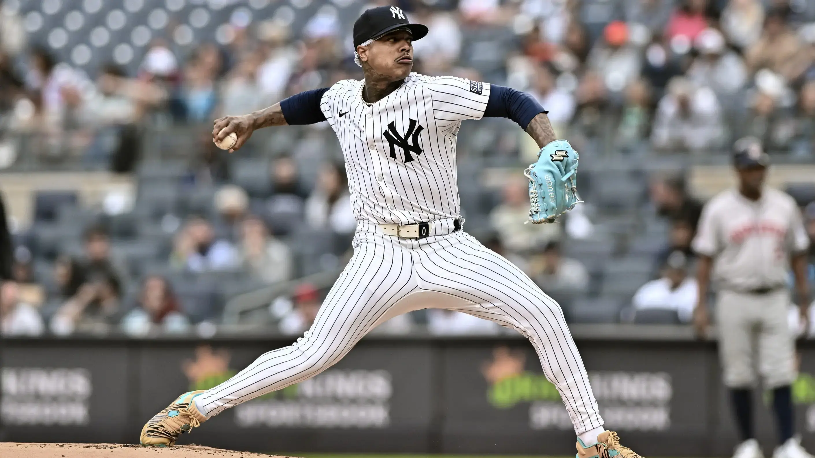 May 9, 2024; Bronx, New York, USA; New York Yankees pitcher Marcus Stroman (0) pitches against the Houston Astros during the first inning at Yankee Stadium. / John Jones-USA TODAY Sports
