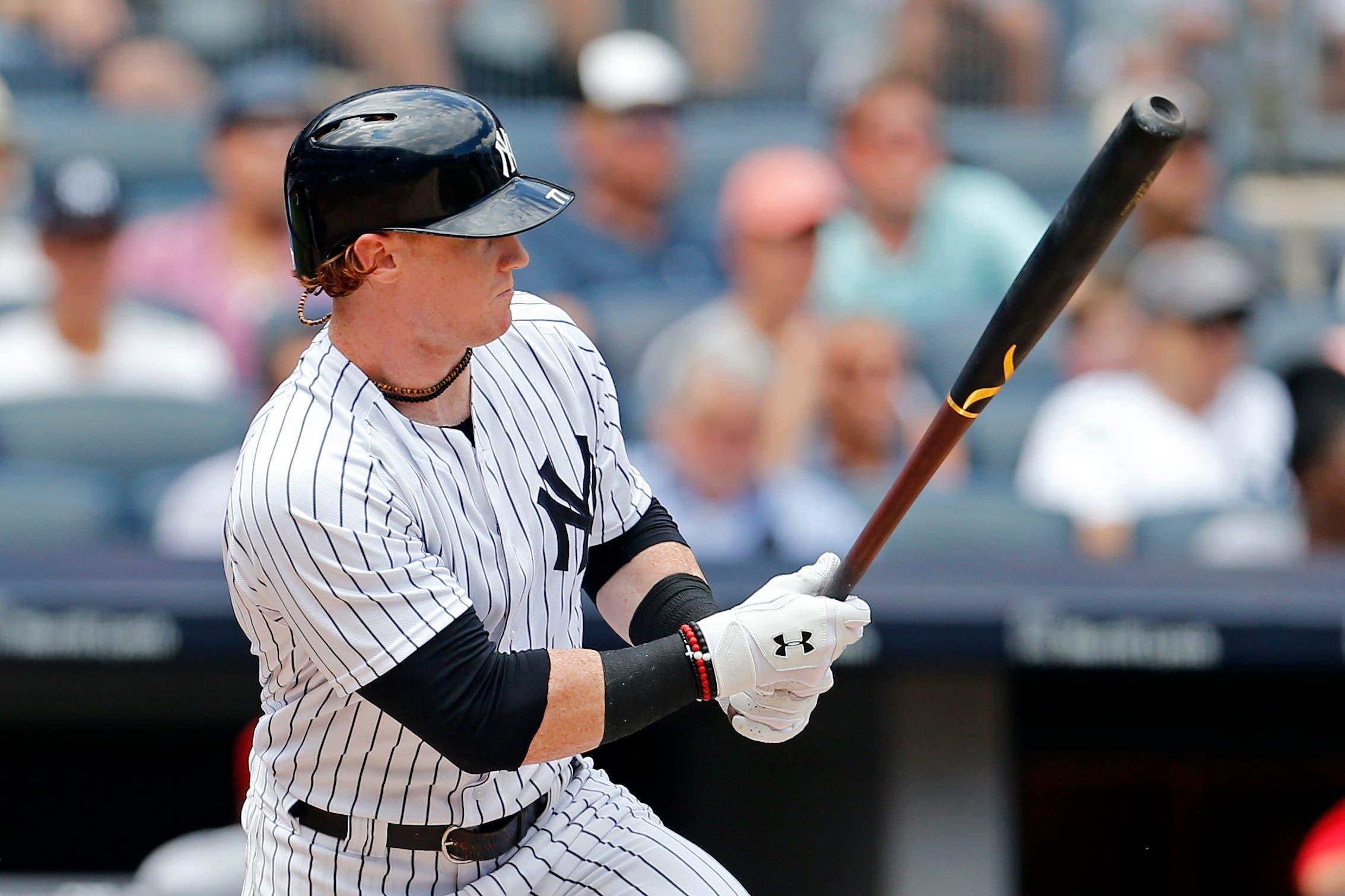 New York Yankees left fielder Clint Frazier watches an RBI single against the Cincinnati Reds during the fifth inning at Yankee Stadium. / Adam Hunger/USA TODAY Sports