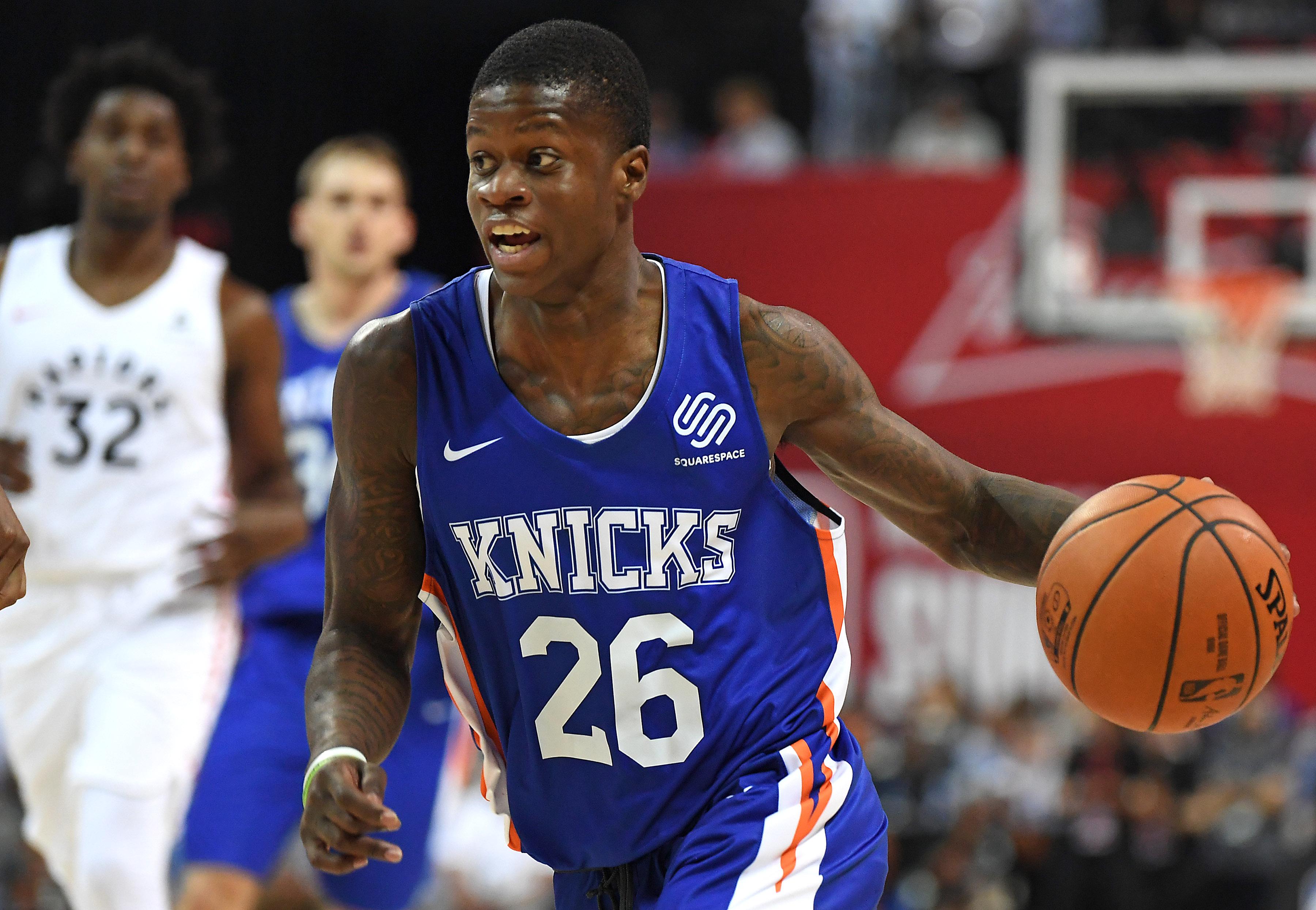 Jul 9, 2019; Las Vegas, NV, USA; New York Knicks guard Amir Hinton (26) dribbles during the second half of an NBA Summer League game against the Toronto Raptors at Thomas & Mack Center. Mandatory Credit: Stephen R. Sylvanie-USA TODAY Sports