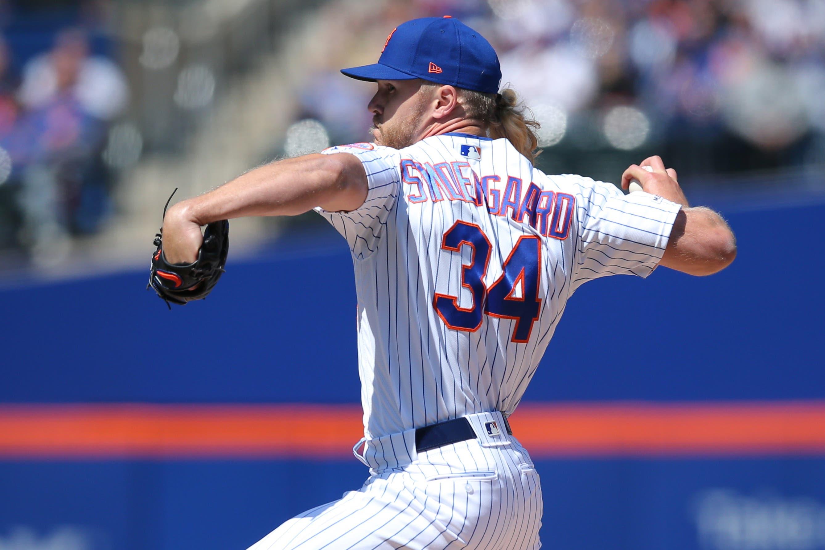 Apr 4, 2019; New York City, NY, USA; New York Mets starting pitcher Noah Syndergaard (34) pitches against the Washington Nationals during the first inning at Citi Field. Mandatory Credit: Brad Penner-USA TODAY Sports / Brad Penner