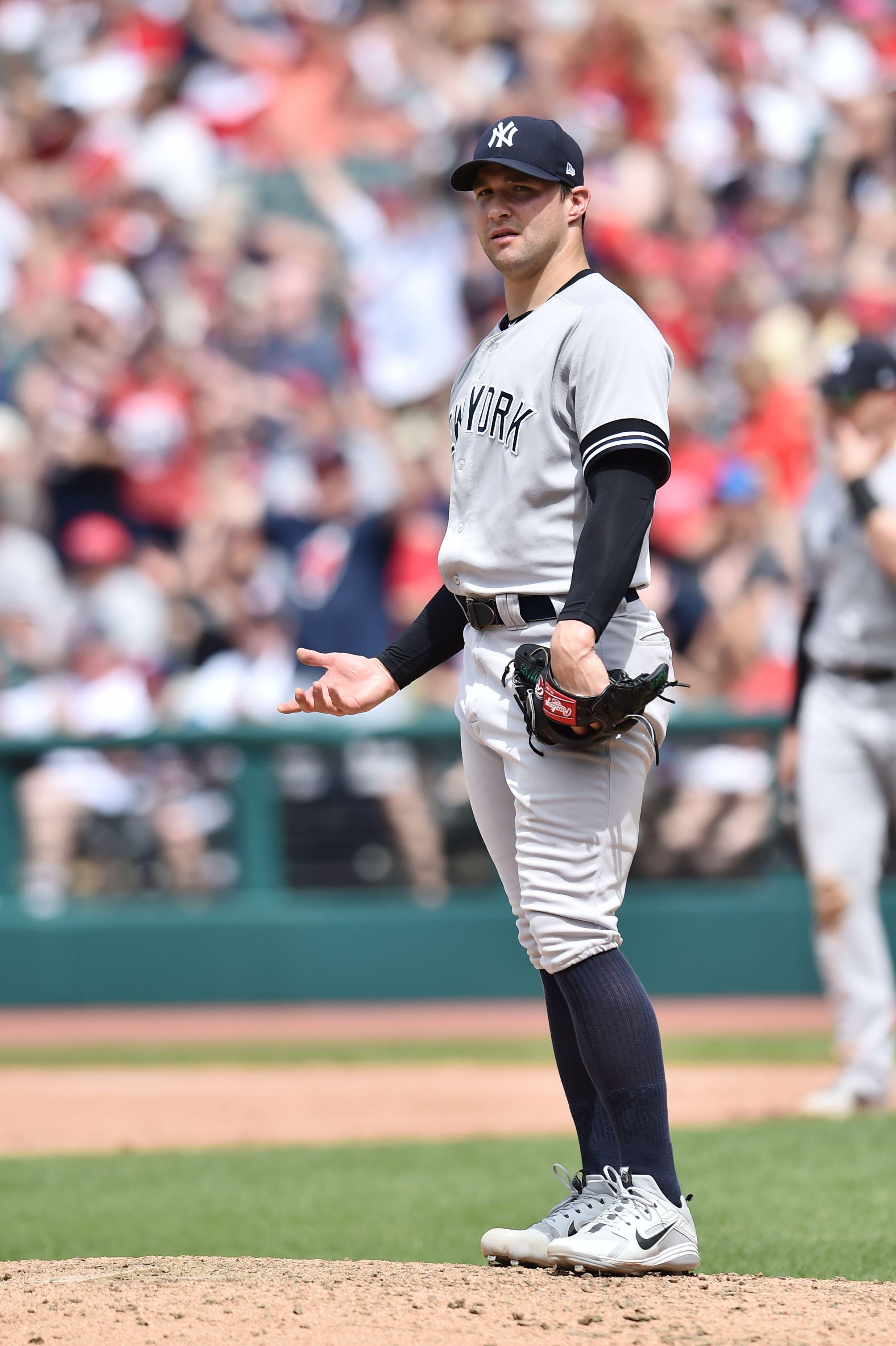 New York Yankees relief pitcher Tommy Kahnle reacts after giving up a home run to Cleveland Indians second baseman Mike Freeman during the sixth inning at Progressive Field. / Ken Blaze/USA TODAY Sports