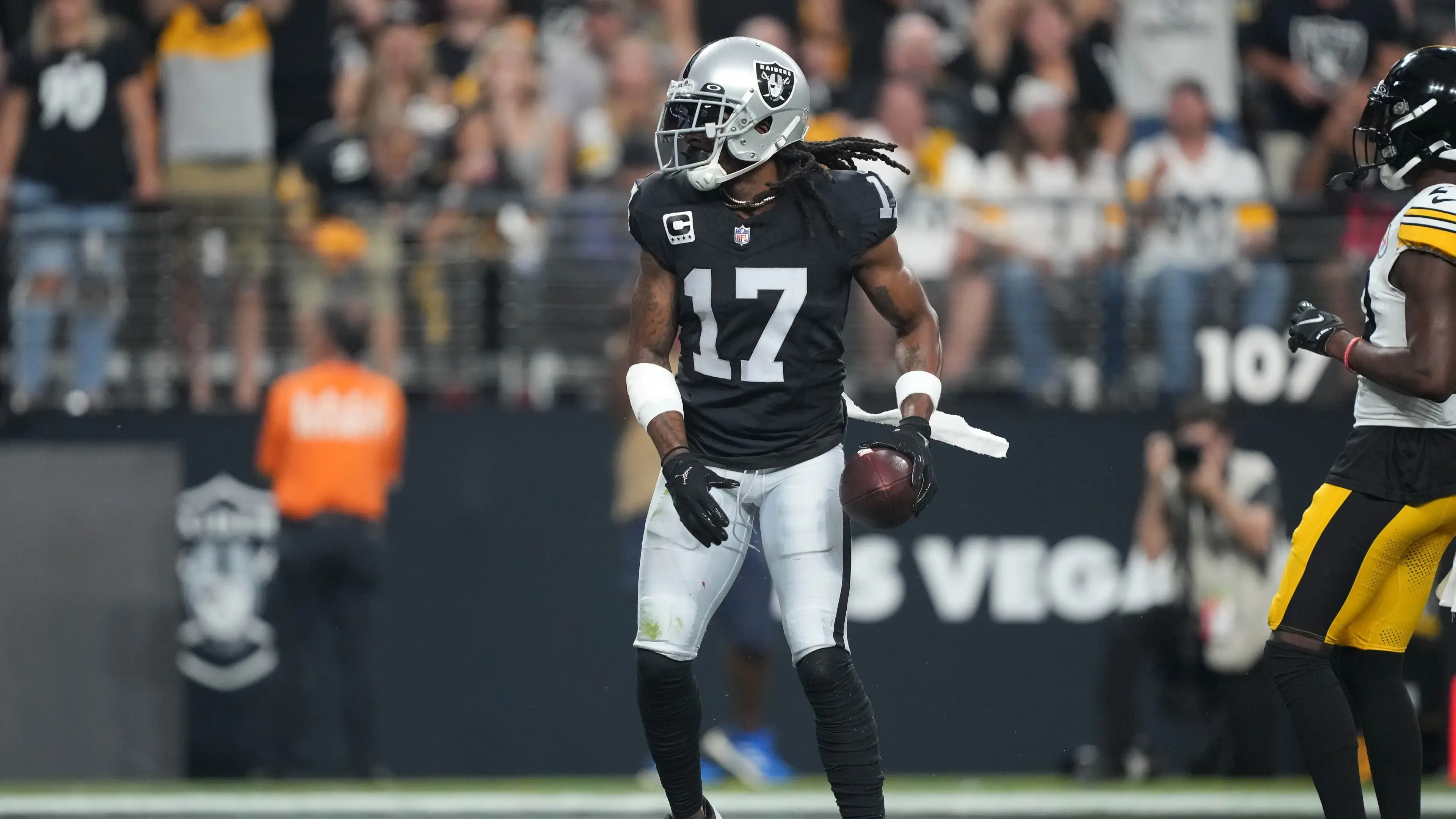 Sep 24, 2023; Paradise, Nevada, USA; Las Vegas Raiders wide receiver Davante Adams (17) reacts after catching a touchdown pass against the Pittsburgh Steelers in the first half at Allegiant Stadium. / Kirby Lee-USA TODAY Sports