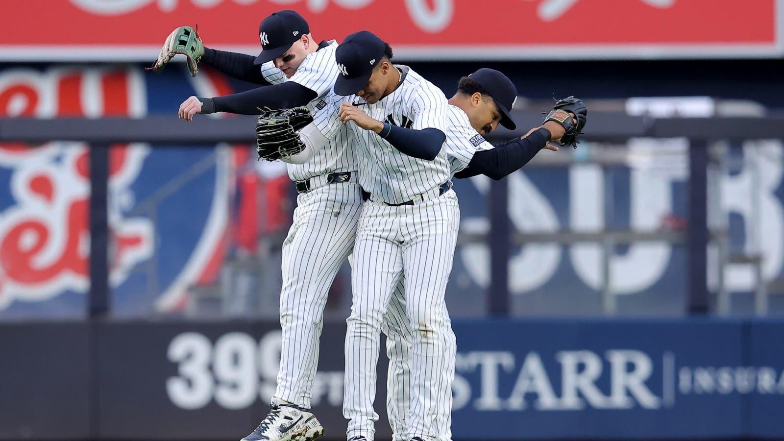 New York Yankees left fielder Alex Verdugo (24) and right fielder Juan Soto (22) and center fielder Trent Grisham (12) celebrate after defeating the Los Angeles Angels at Yankee Stadium. / Brad Penner-USA TODAY Sports