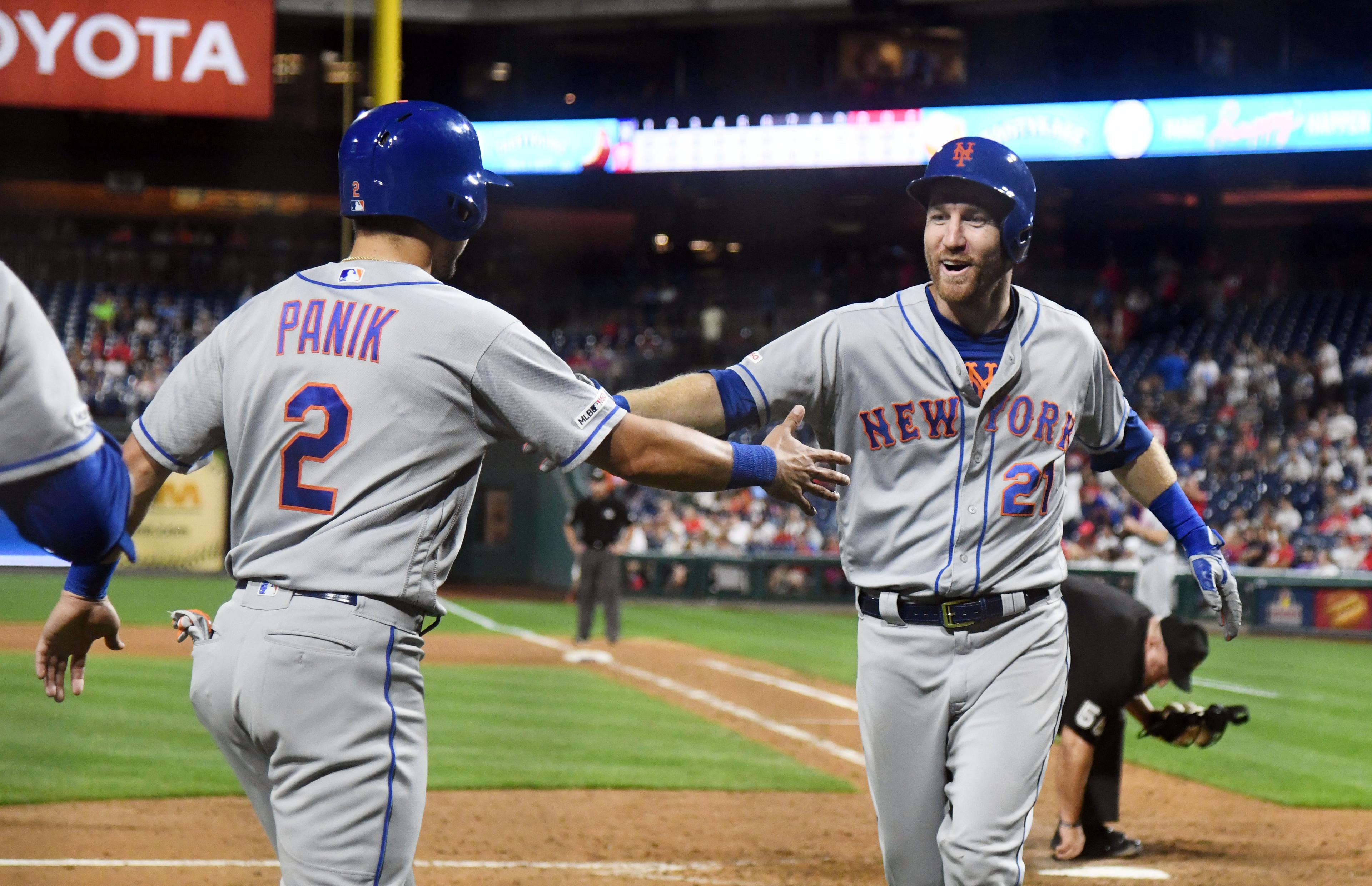 Aug 30, 2019; Philadelphia, PA, USA; New York Mets third baseman Todd Frazier (21) celebrates with second baseman Joe Panik (2) after hitting a three run home run in the ninth inning against the Philadelphia Phillies at Citizens Bank Park. Mandatory Credit: James Lang-USA TODAY Sports