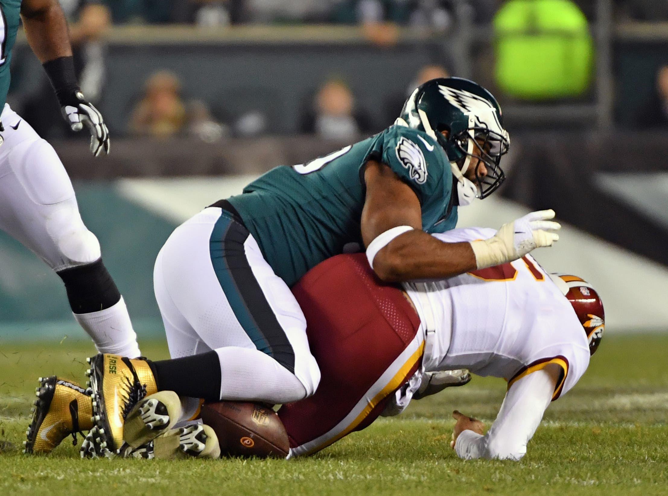 Dec 3, 2018; Philadelphia, PA, USA; Philadelphia Eagles defensive end Brandon Graham (55) sacks Washington Redskins quarterback Mark Sanchez (6) causing a fumble during the second quarter at Lincoln Financial Field. Mandatory Credit: Eric Hartline-USA TODAY Sports / Eric Hartline