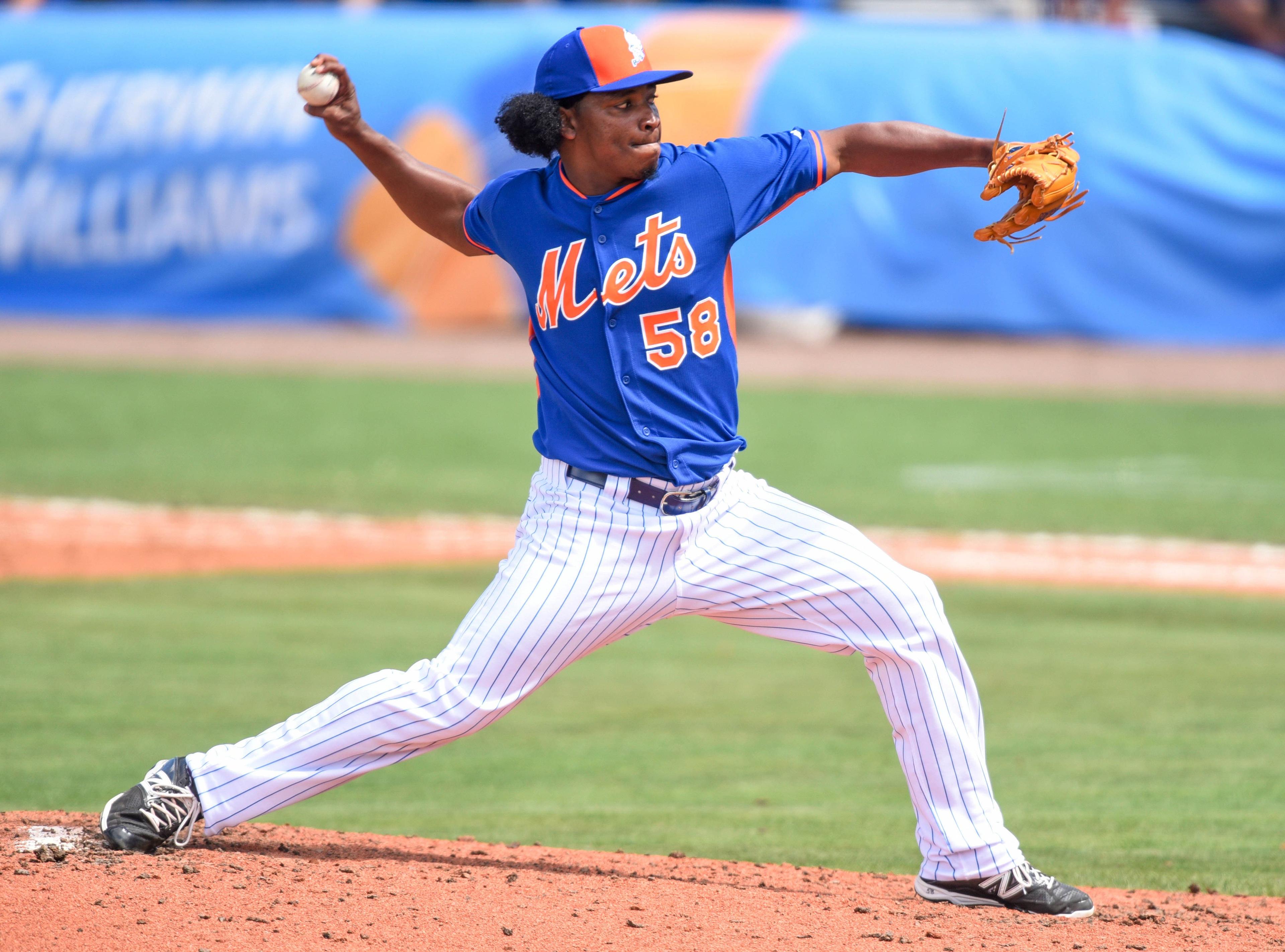 New York Mets relief pitcher Jenrry Mejia (58) throws against the Miami Marlins during the spring training baseball game at Tradition Field in 2015. / Brad Barr