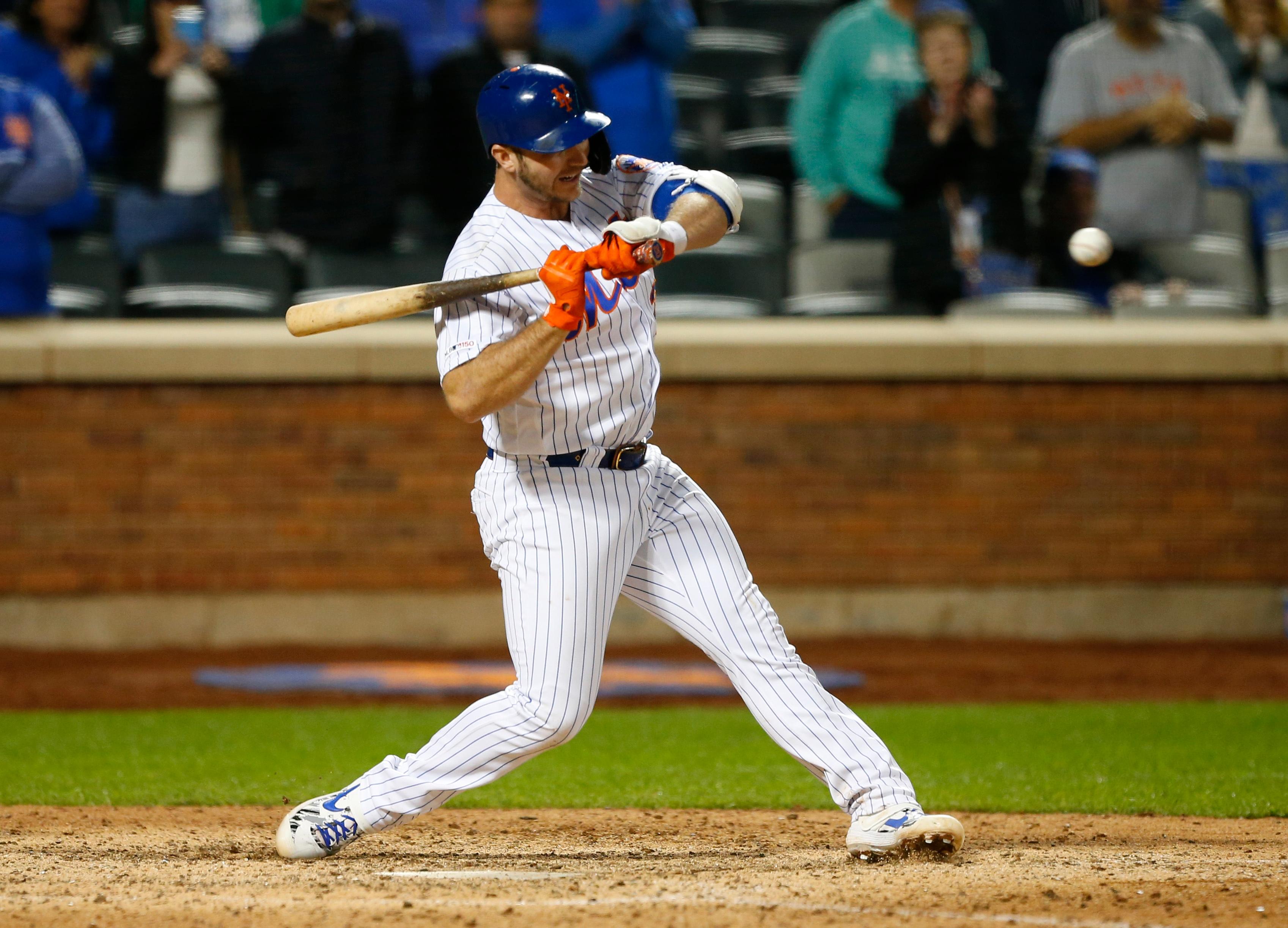 Sep 6, 2019; New York City, NY, USA; New York Mets first baseman Pete Alonso (20) takes a ball for a walk off walk in the tenth inning against the Philadelphia Phillies at Citi Field. Mandatory Credit: Noah K. Murray-USA TODAY Sports