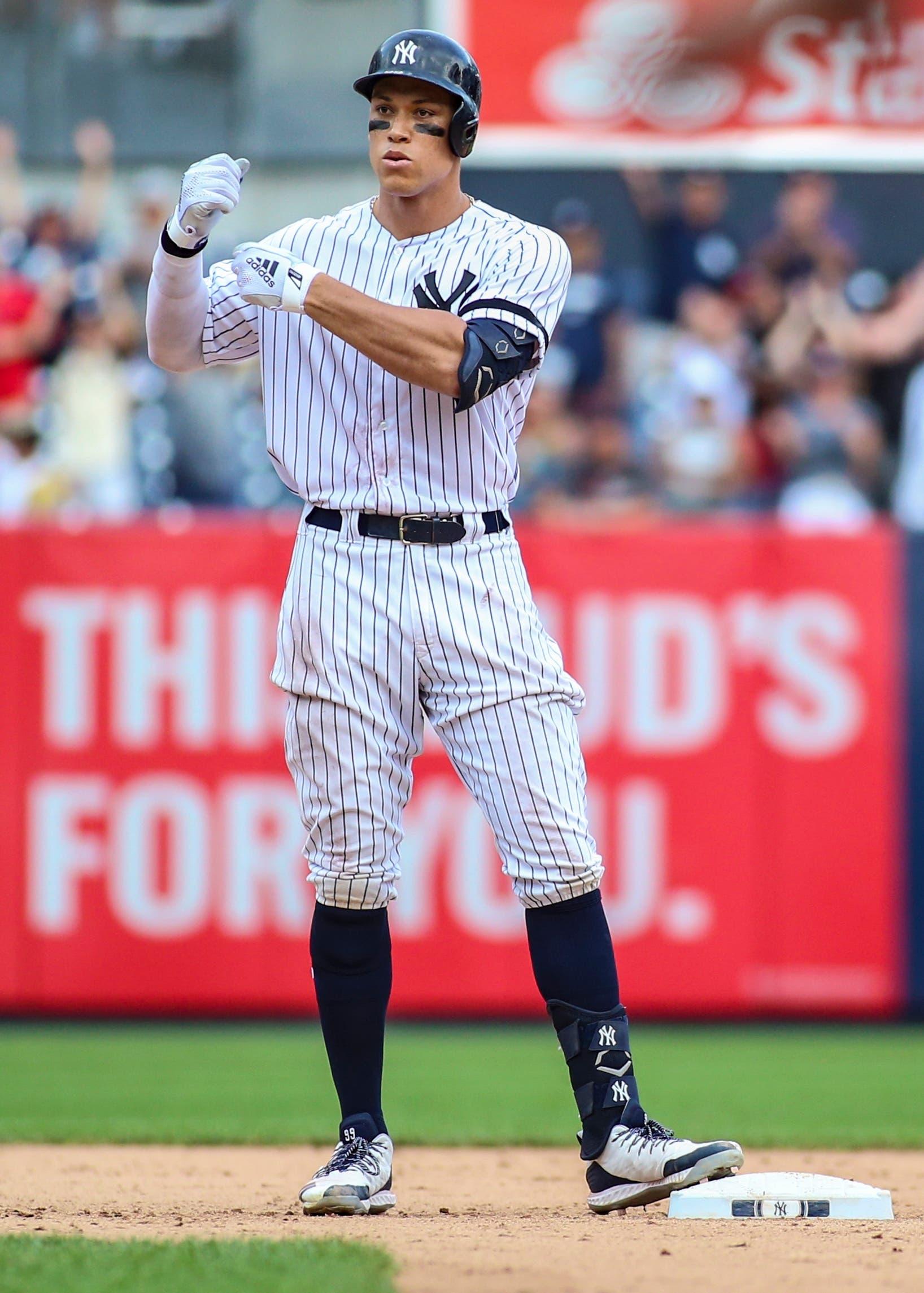 Aug 18, 2019; Bronx, NY, USA; New York Yankees right fielder Aaron Judge (99) reacts after hitting an RBI double in the ninth inning against the Cleveland Indians at Yankee Stadium. Mandatory Credit: Wendell Cruz-USA TODAY Sports / Wendell Cruz