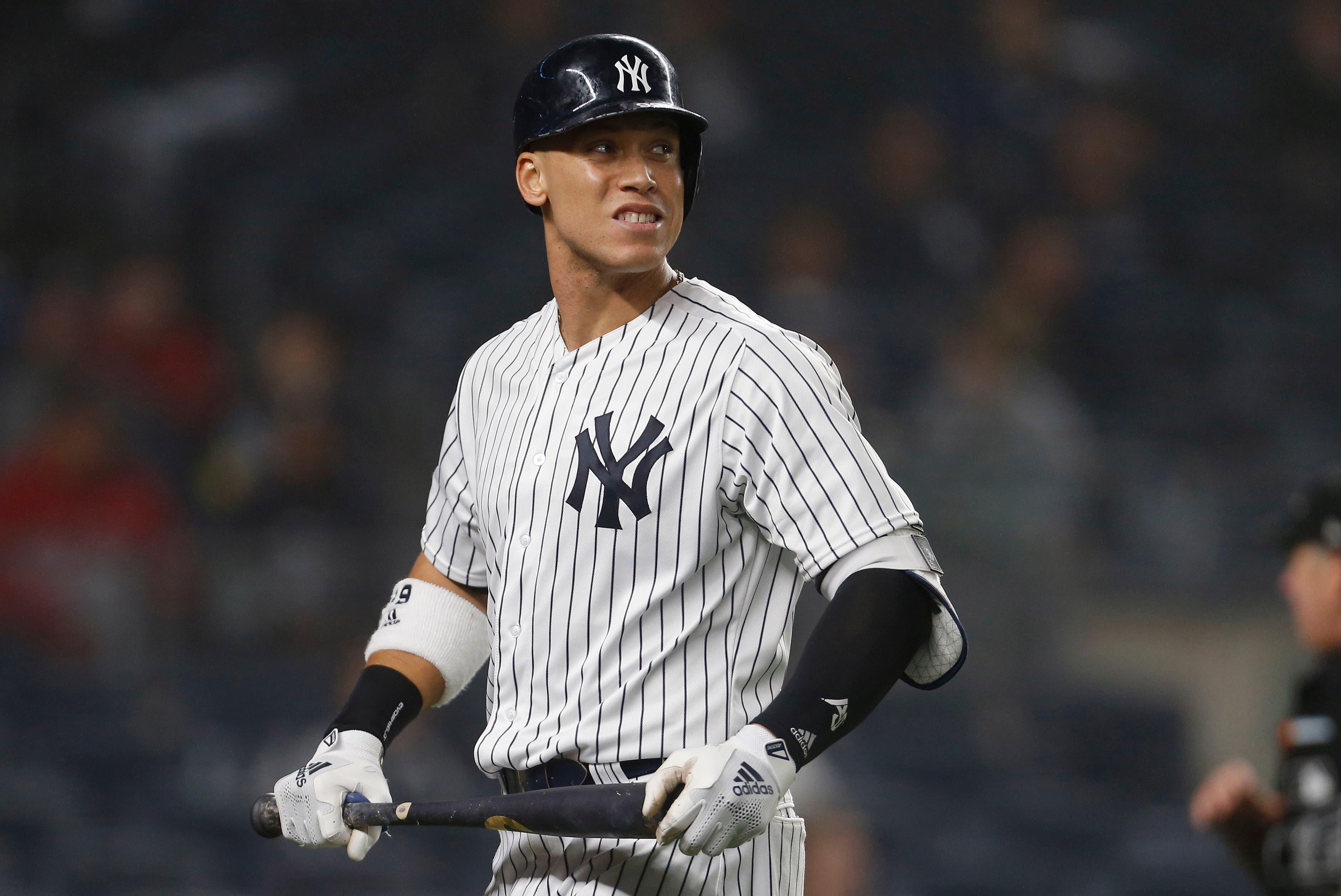 New York Yankees right fielder Aaron Judge reacts after striking out in the eighth inning against the Boston Red Sox in Game 3 of the 2018 ALDS at Yankee Stadium. / Adam Hunger/USA TODAY Sports