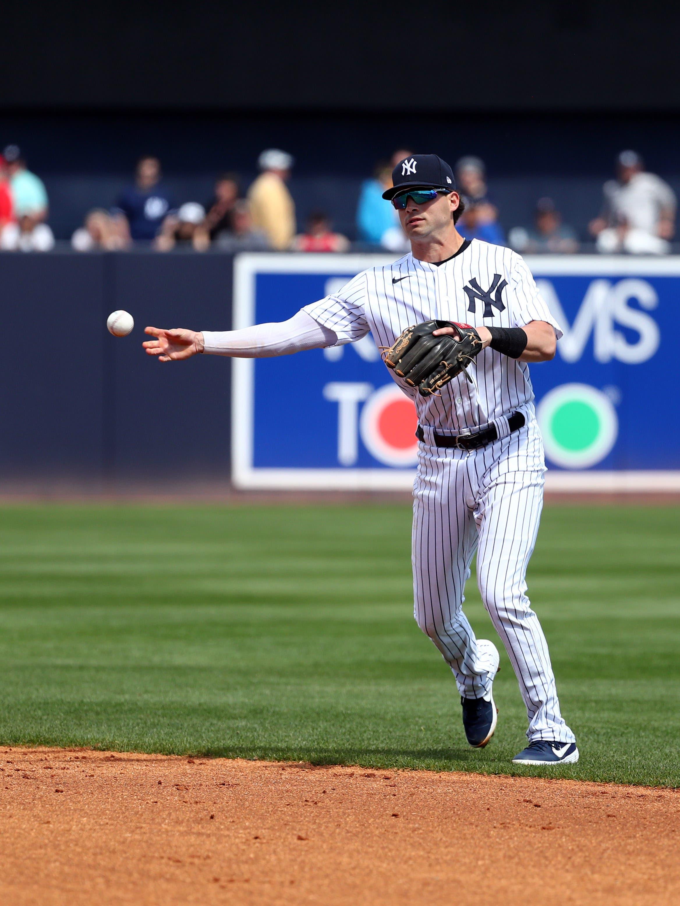 Mar 8, 2020; Tampa, Florida, USA; New York Yankees shortstop Tyler Wade (14) throws the ball to first base for an out during the second inning against the Atlanta Braves at George M. Steinbrenner Field. Mandatory Credit: Kim Klement-USA TODAY Sports / Kim Klement