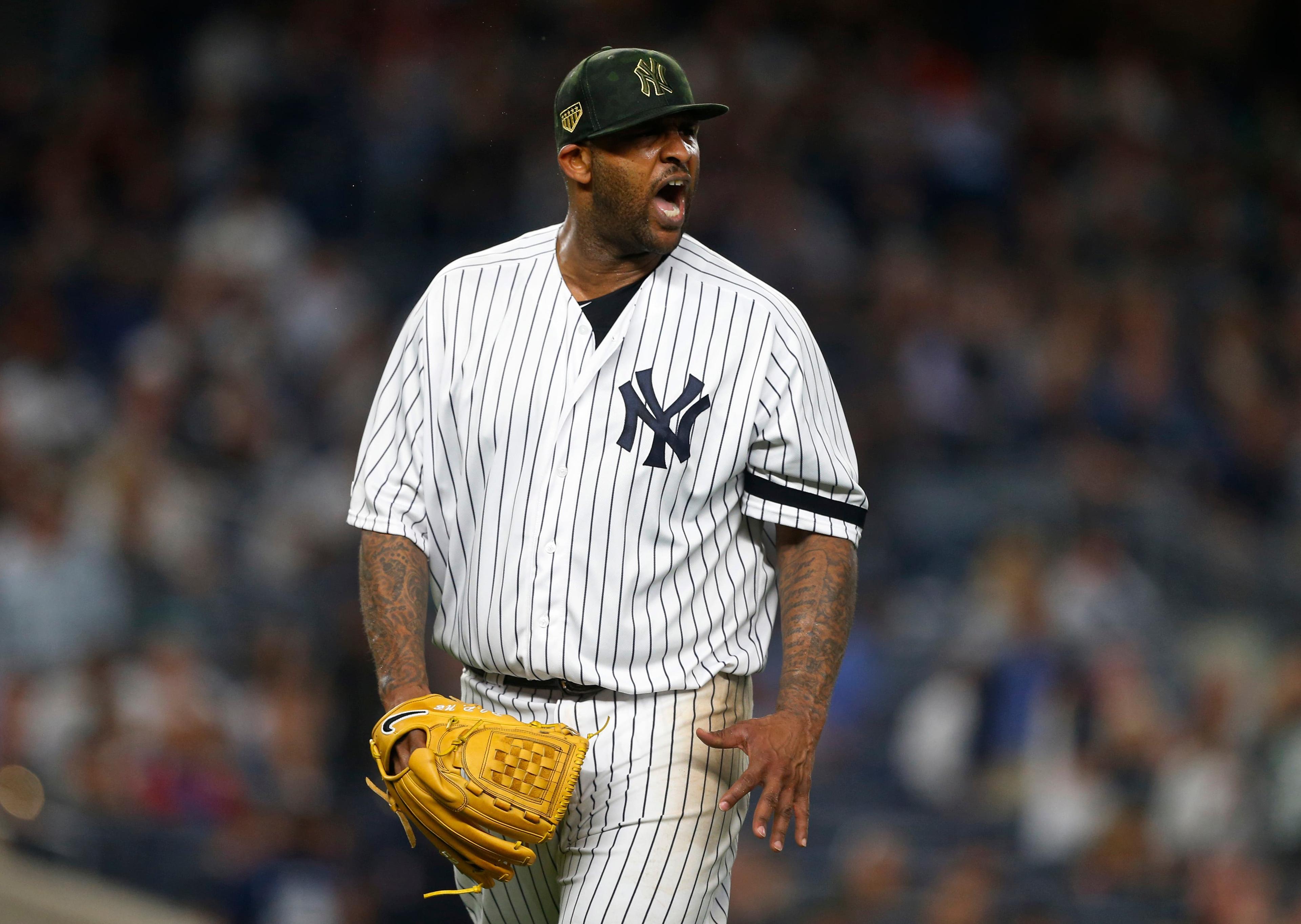 May 17, 2019; Bronx, NY, USA; New York Yankees starting pitcher CC Sabathia (52) reacts on his way to the dugout in the sixth inning against the Tampa Bay Rays at Yankee Stadium. Mandatory Credit: Noah K. Murray-USA TODAY Sports / Noah K. Murray