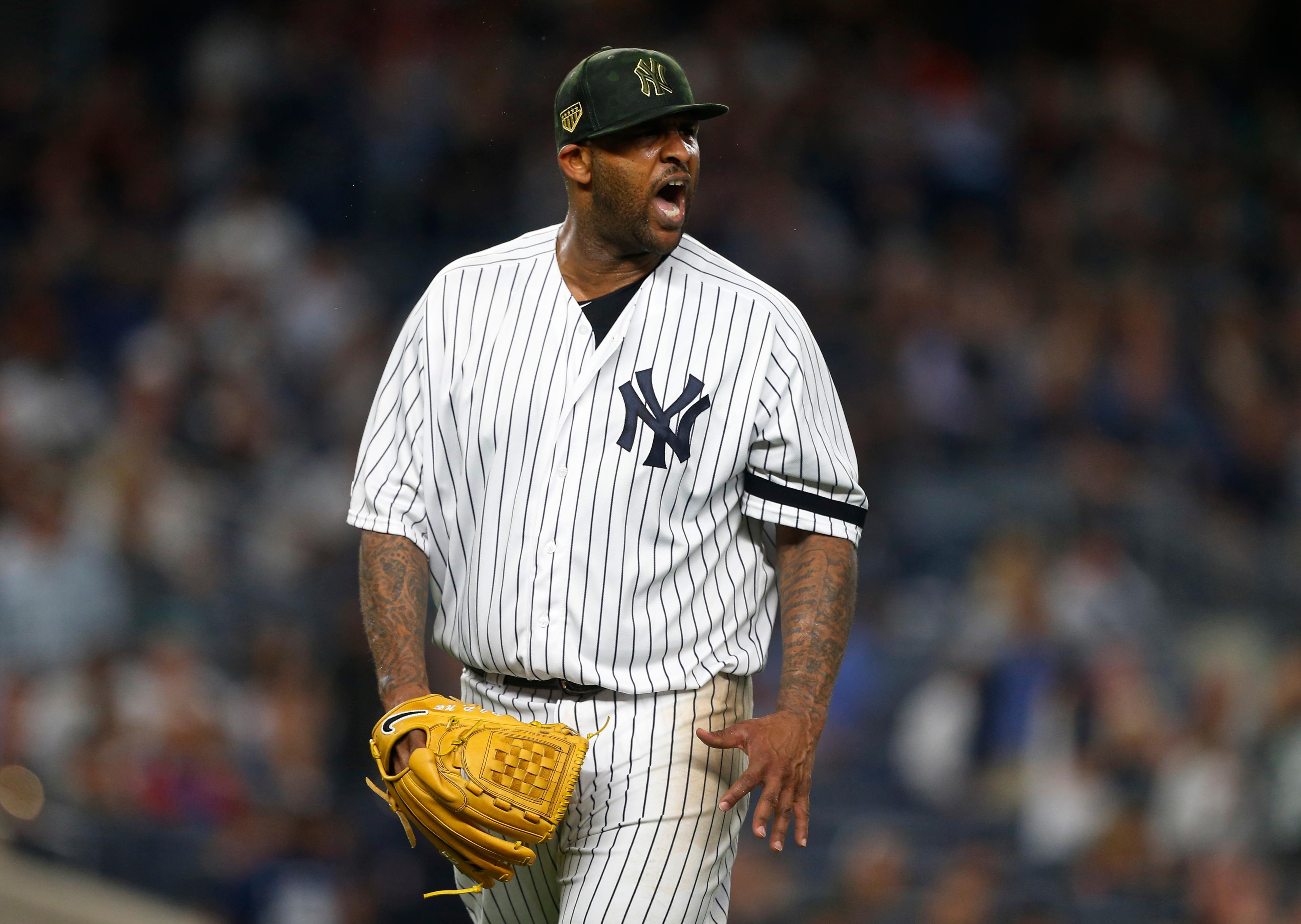 May 17, 2019; Bronx, NY, USA; New York Yankees starting pitcher CC Sabathia (52) reacts on his way to the dugout in the sixth inning against the Tampa Bay Rays at Yankee Stadium. Mandatory Credit: Noah K. Murray-USA TODAY Sports