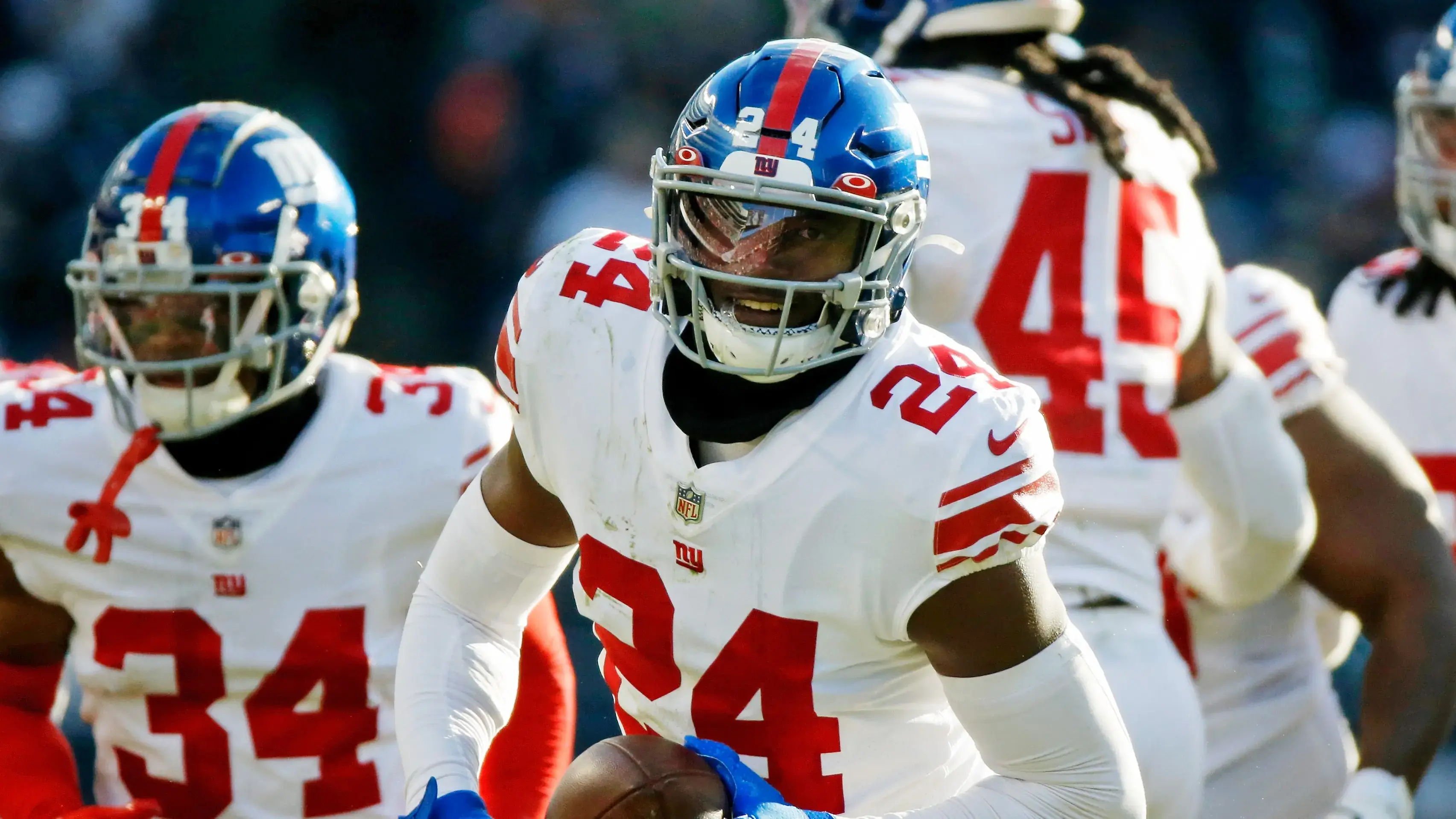 New York Giants cornerback James Bradberry (24) reacts after intercepting a pass against the Chicago Bears during the second half at Soldier Field. / Jon Durr- USA TODAY Sports