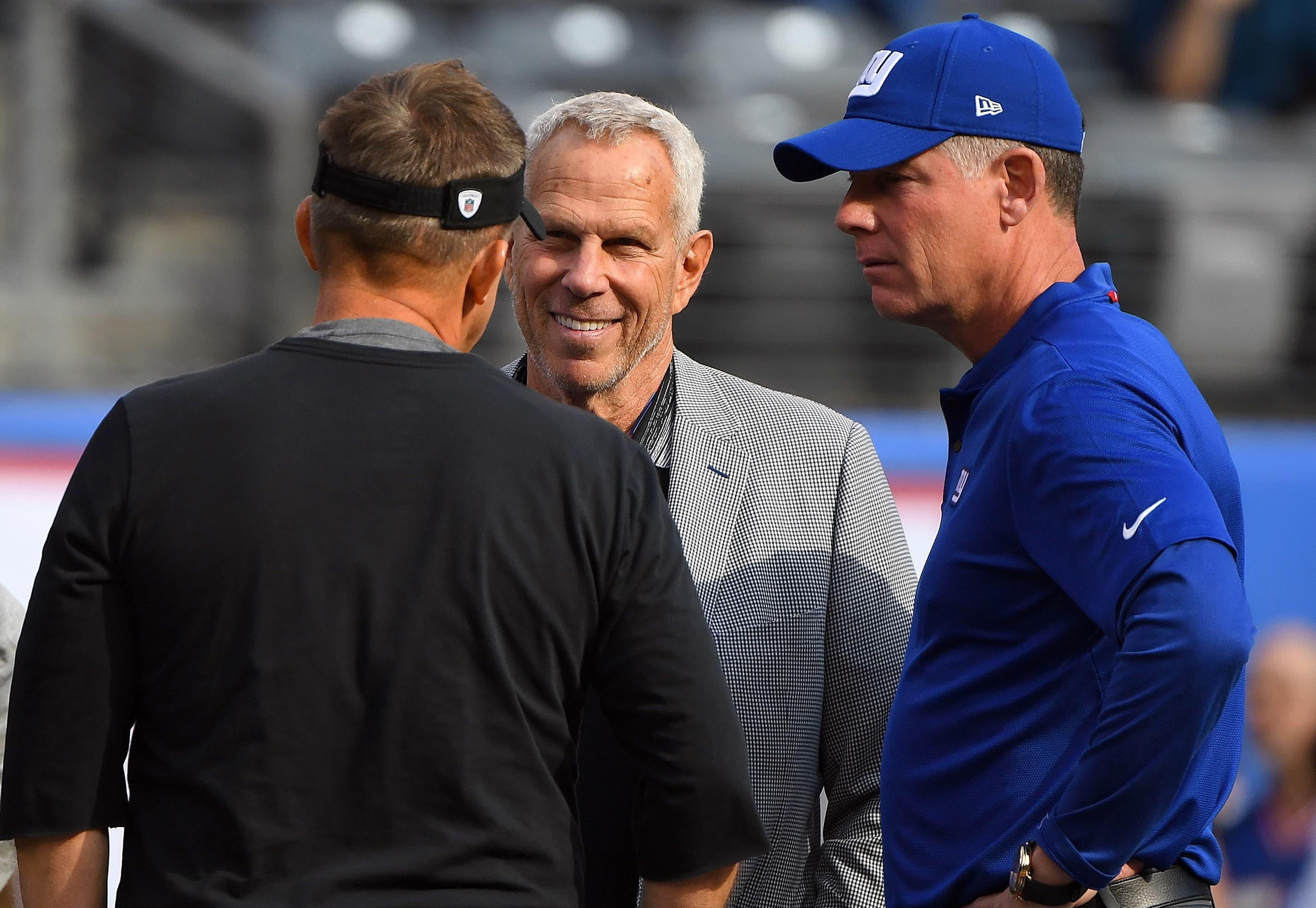 Sep 30, 2018; East Rutherford, NJ, USA; New York Giants chairman Steve Tisch talks to New Orleans Saints head coach Sean Payton , left, and New York Giants head coach Pat Shurmur before their game at MetLife Stadium. Mandatory Credit: Robert Deutsch-USA TODAY Sports / Robert Deutsch