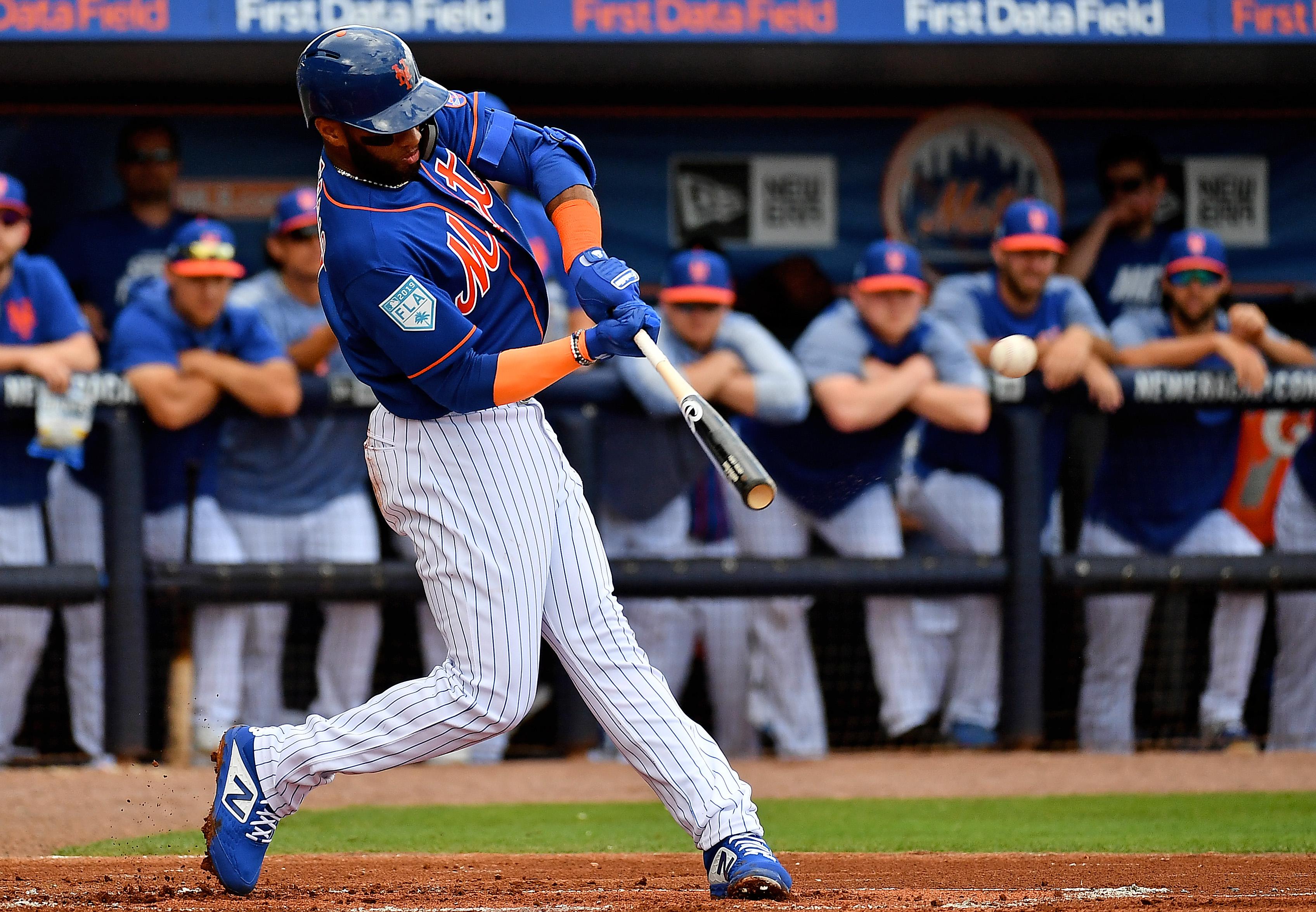 Jul 25, 2018; New York City, NY, USA; New York Mets shortstop Amed Rosario (1) hits a two RBI single against the San Diego Padres during the fifth inning at Citi Field. Mandatory Credit: Andy Marlin-USA TODAY Sports