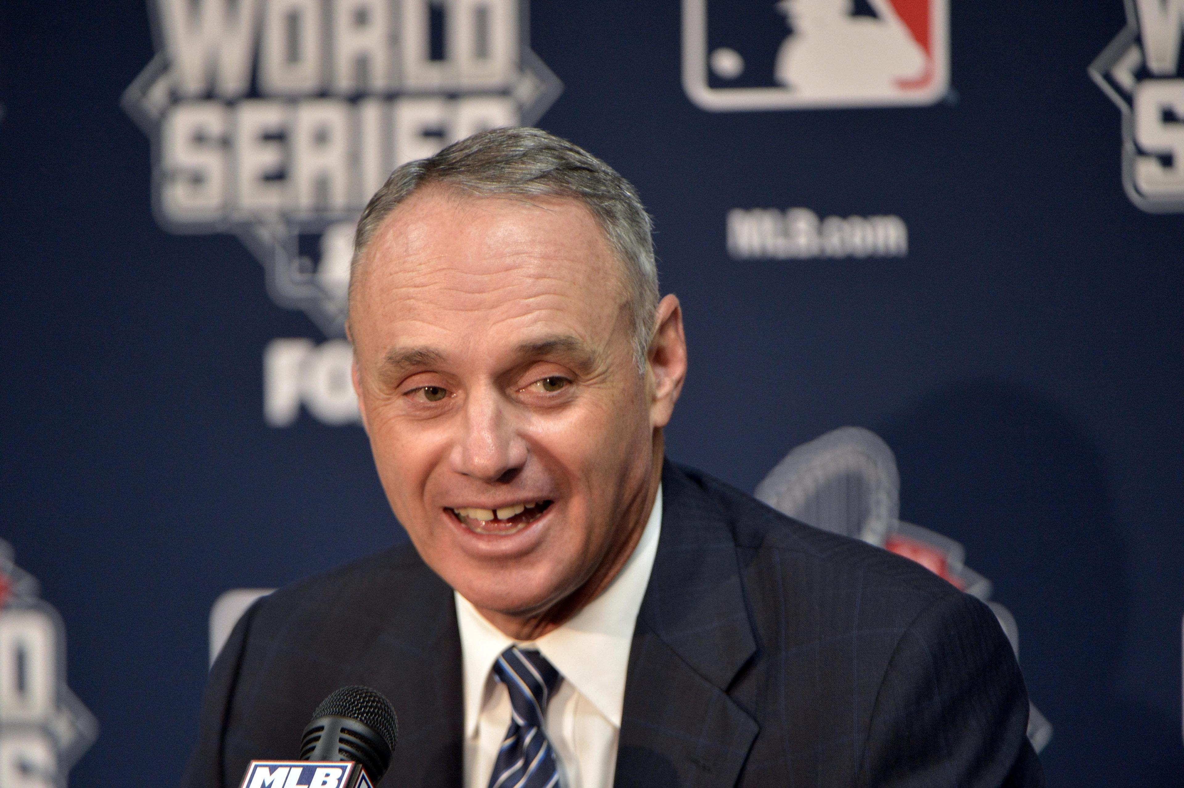 MLB commissioner Robert D. Manfred Jr. answers questions from media during workouts the day before Game 1 of the 2015 World Series against the New York Mets at Kauffman Stadium. / Denny Medley/USA Today Sports Images