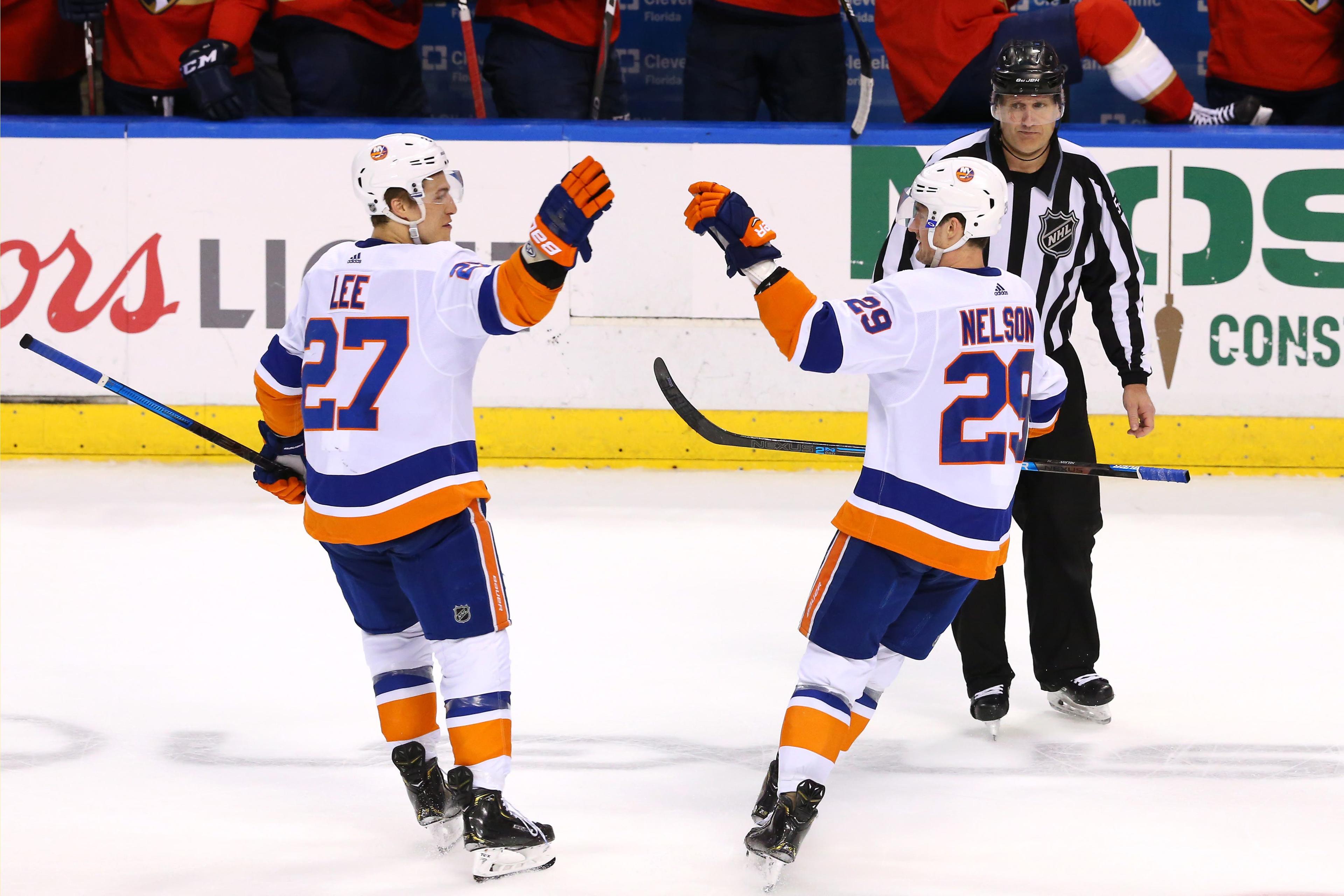 Apr 4, 2019; Sunrise, FL, USA; New York Islanders center Brock Nelson (29) celebrates his game winning goal in a shootout against the Florida Panthers with left wing Anders Lee (27). Mandatory Credit: Robert Mayer-USA TODAY Sports / Robert Mayer