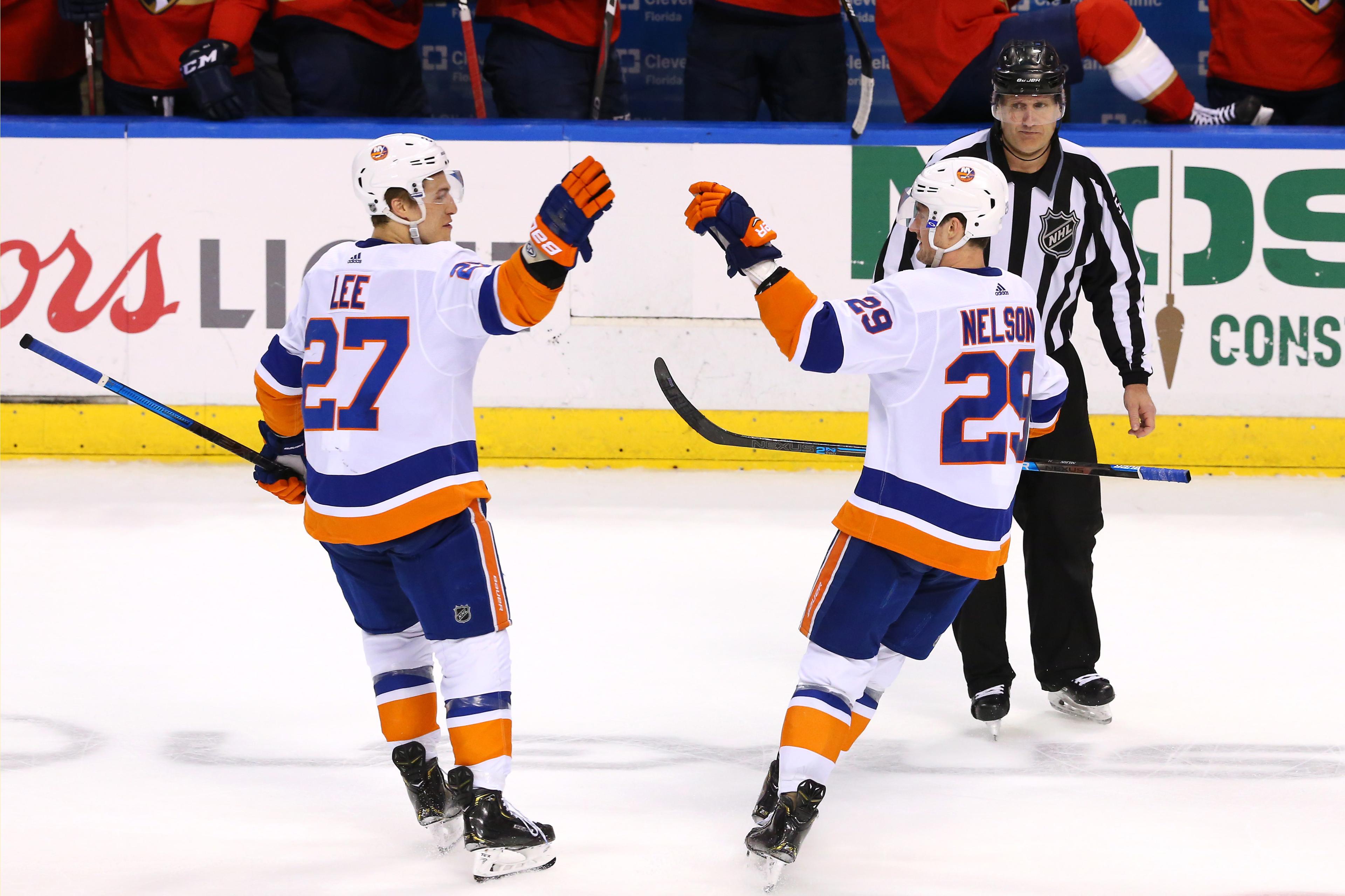 Apr 4, 2019; Sunrise, FL, USA; New York Islanders center Brock Nelson (29) celebrates his game winning goal in a shootout against the Florida Panthers with left wing Anders Lee (27). Mandatory Credit: Robert Mayer-USA TODAY Sports