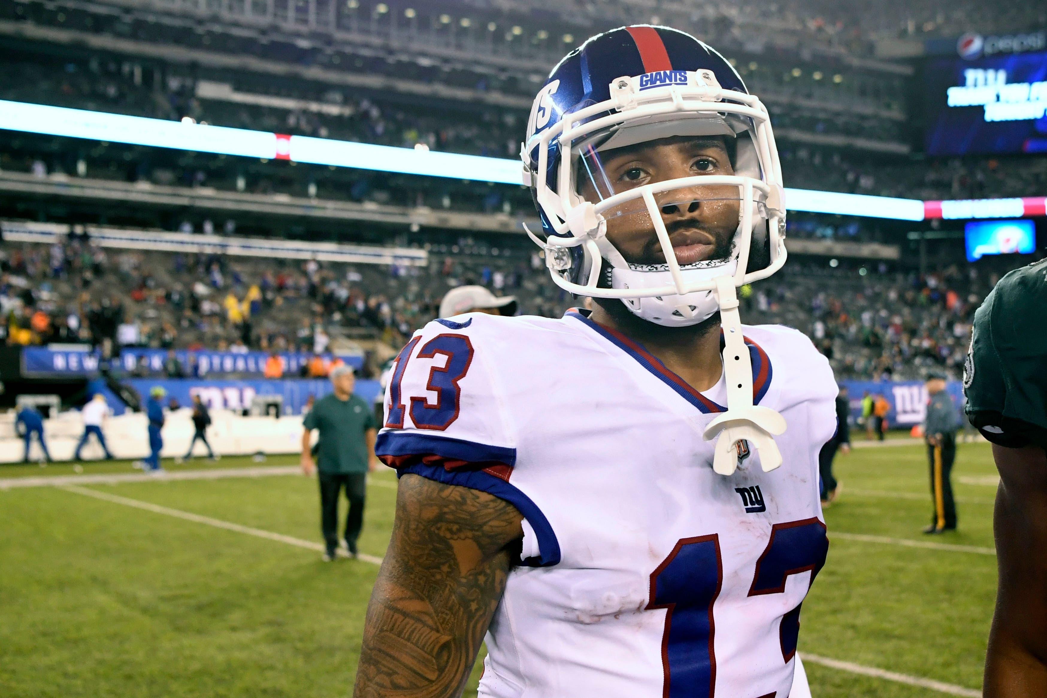 Oct 11, 2018; East Rutherford, NJ, USA; New York Giants wide receiver Odell Beckham Jr. (13) walks off the field after a 34-13 loss to the Philadelphia Eagles at MetLife Stadium. Mandatory Credit: Danielle Parhizkaran/NorthJersey.com via USA TODAY NETWORK / Danielle Parhizkaran