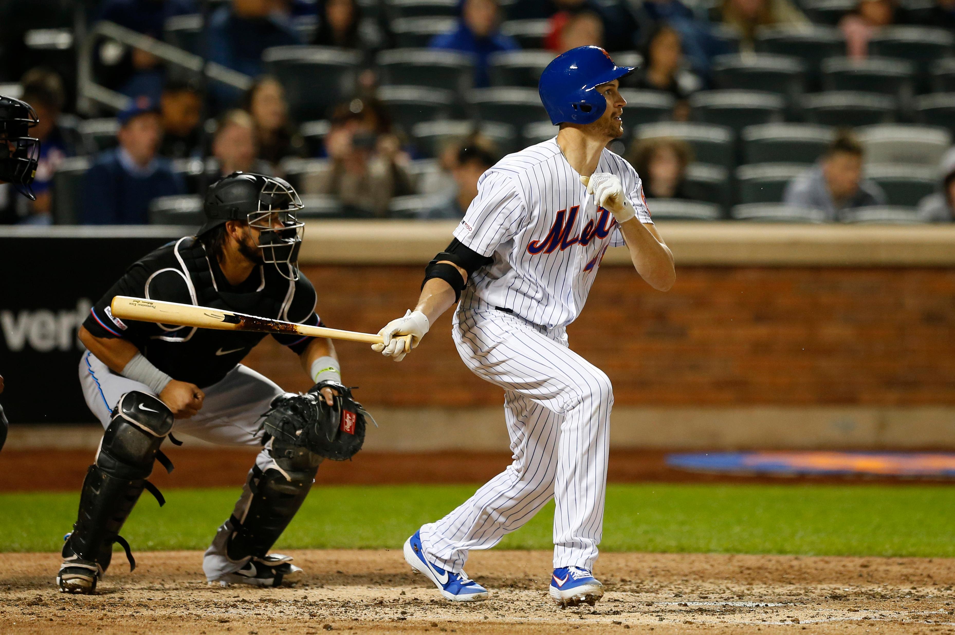 May 11, 2019; New York City, NY, USA; New York Mets starting pitcher Jacob deGrom (48) follows through on a single against the Miami Marlins in the sixth inning at Citi Field. Mandatory Credit: Noah K. Murray-USA TODAY Sports